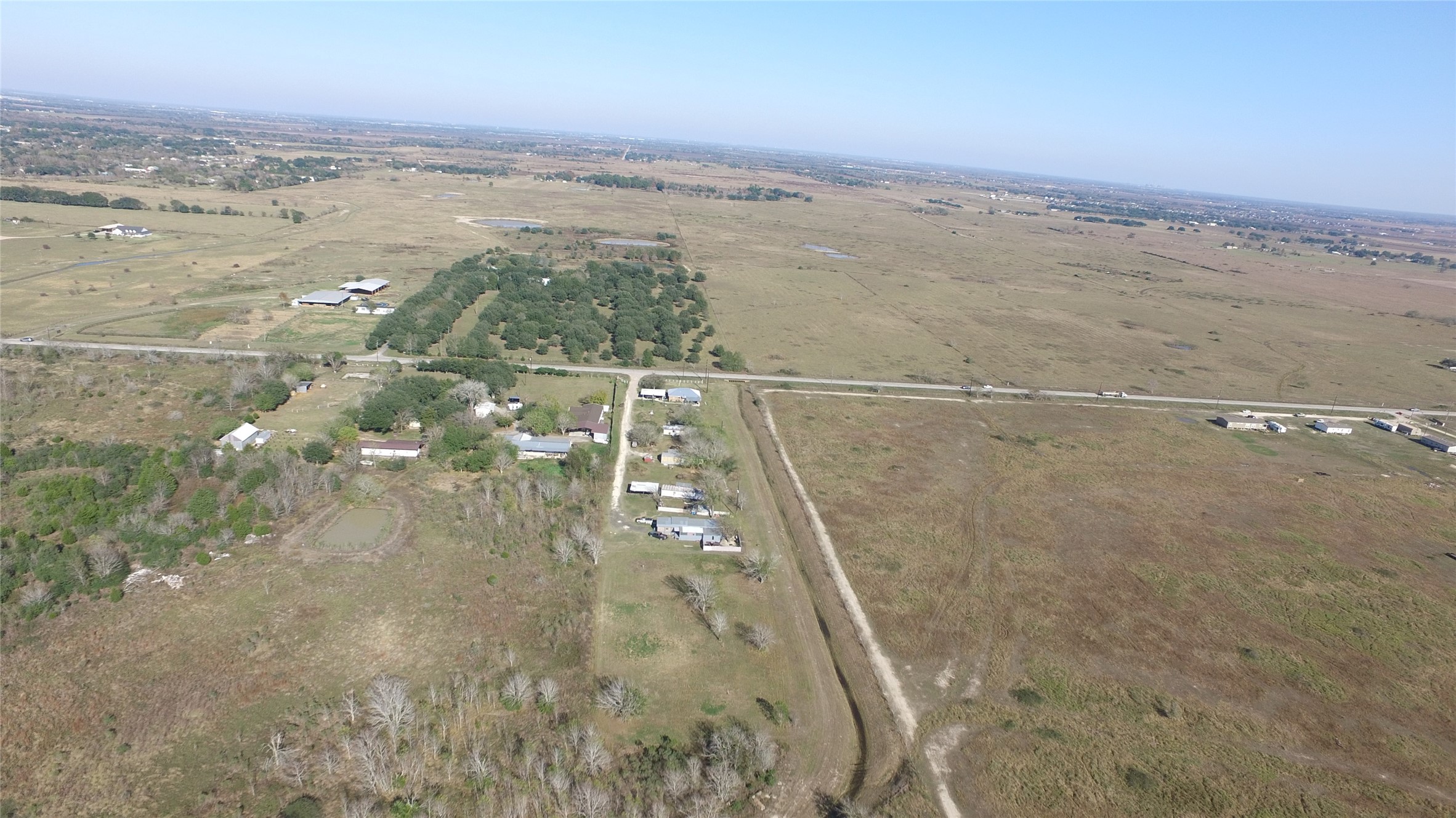 6018 FM 360 Road Needville, TX 77461 - Photo 7 of 50 a view of a walk in an empty room