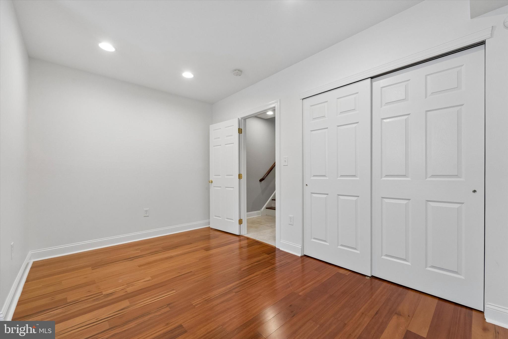 2001 Carpenter Street, Unit B Philadelphia, PA 19146 - Photo 18 of 31 a view of empty room with wooden floor