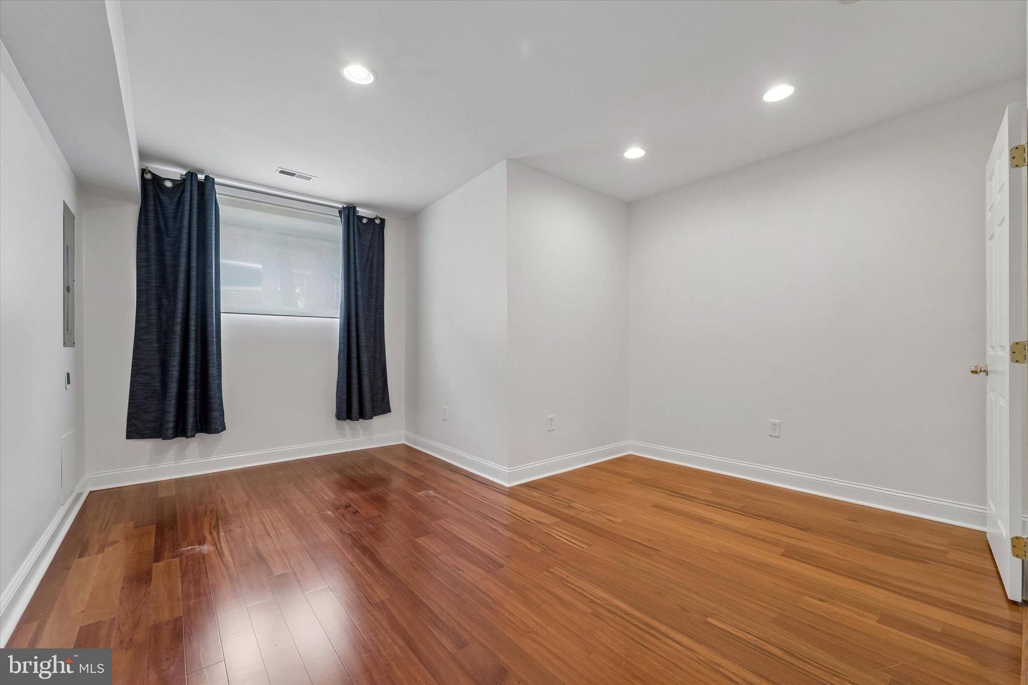 2001 Carpenter Street, Unit B Philadelphia, PA 19146 - Photo 19 of 31 a view of a room with wooden floor