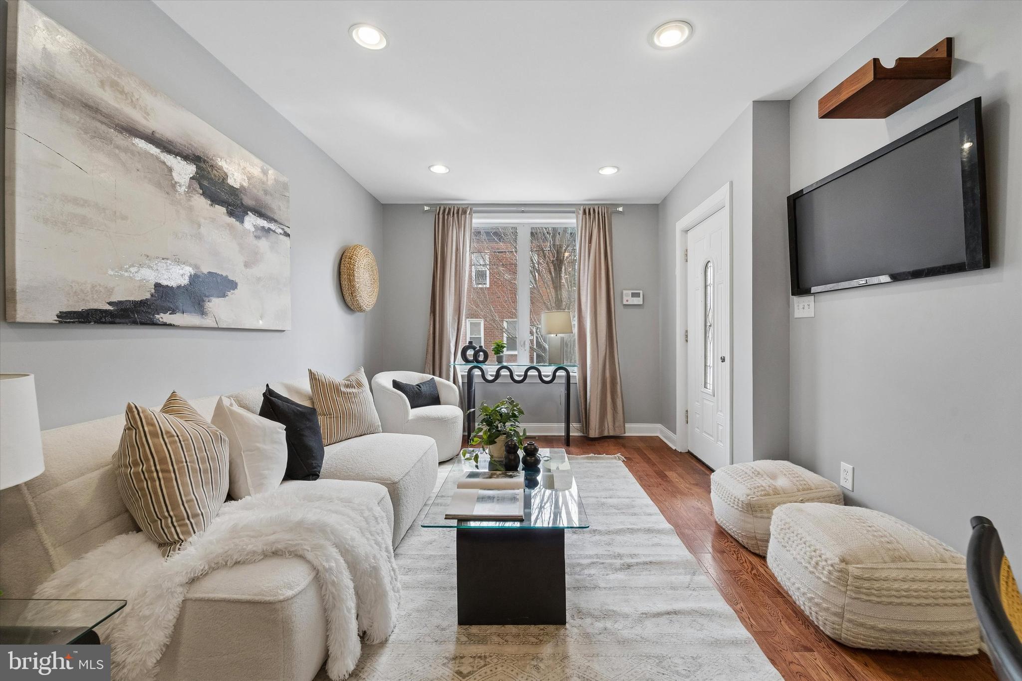 2001 Carpenter Street, Unit B Philadelphia, PA 19146 - Photo 3 of 31 a living room with furniture and a flat screen tv