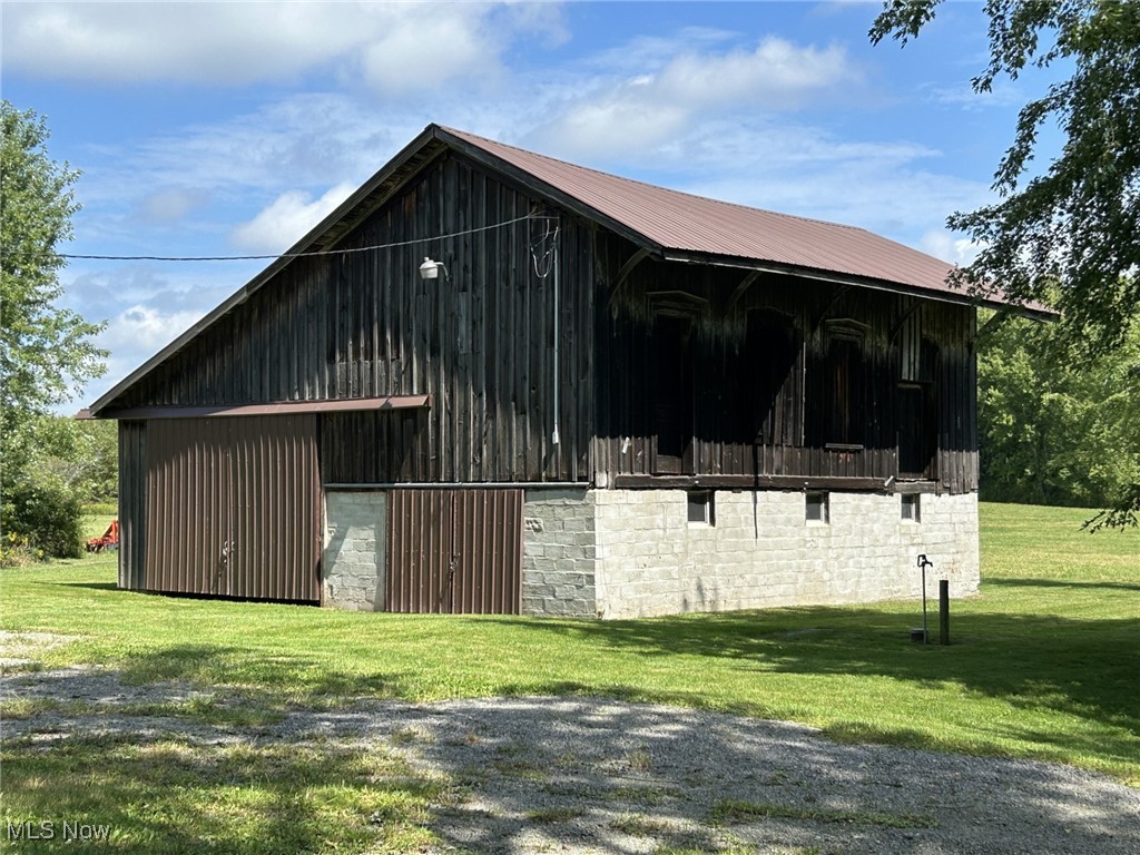 4853 Leon Road Andover, OH 44003 - Photo 5 of 33 View of stable featuring an outdoor structure and a yard