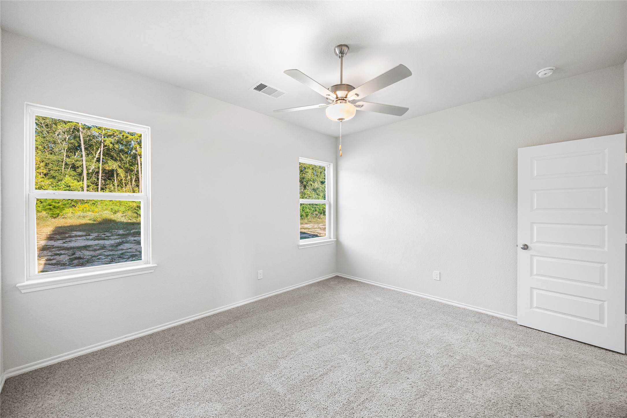 25799 John Wayne Court Splendora, TX 77372 - Photo 16 of 28 a view of an empty room with a window