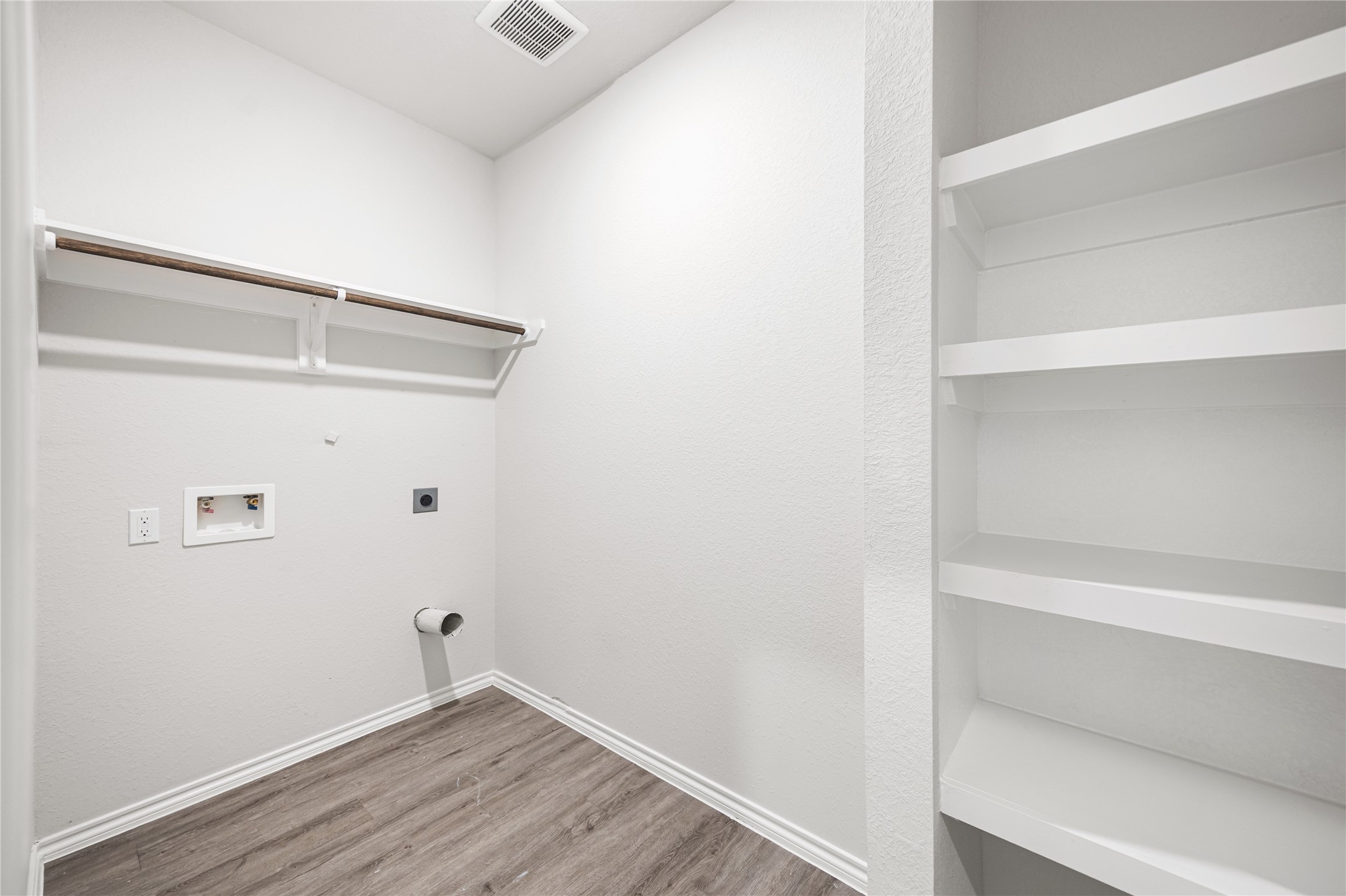 25799 John Wayne Court Splendora, TX 77372 - Photo 22 of 28 a view of an empty walk in closet