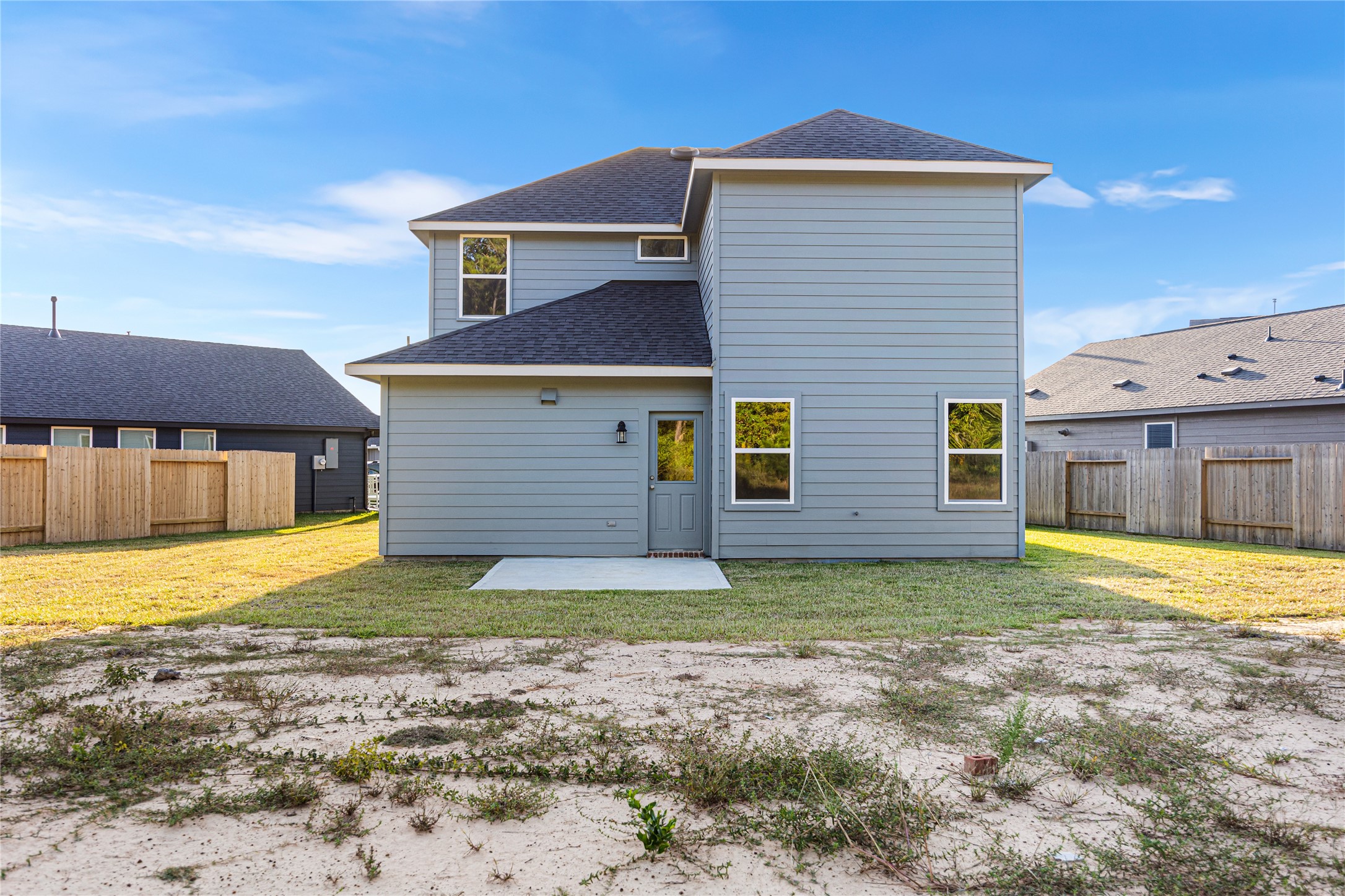 25799 John Wayne Court Splendora, TX 77372 - Photo 28 of 28 a front view of a house with a yard