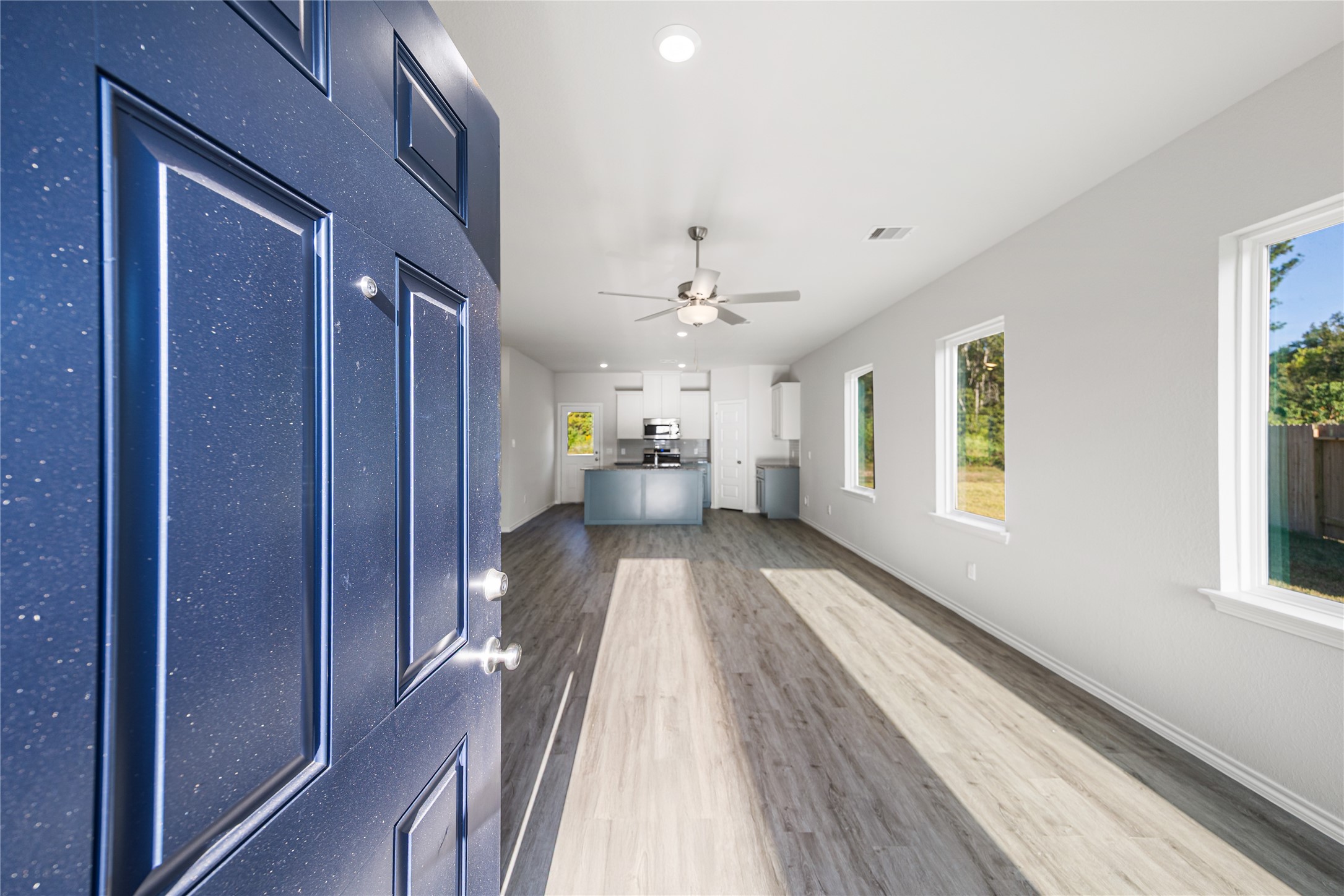 25799 John Wayne Court Splendora, TX 77372 - Photo 4 of 28 a view of entryway with wooden floor