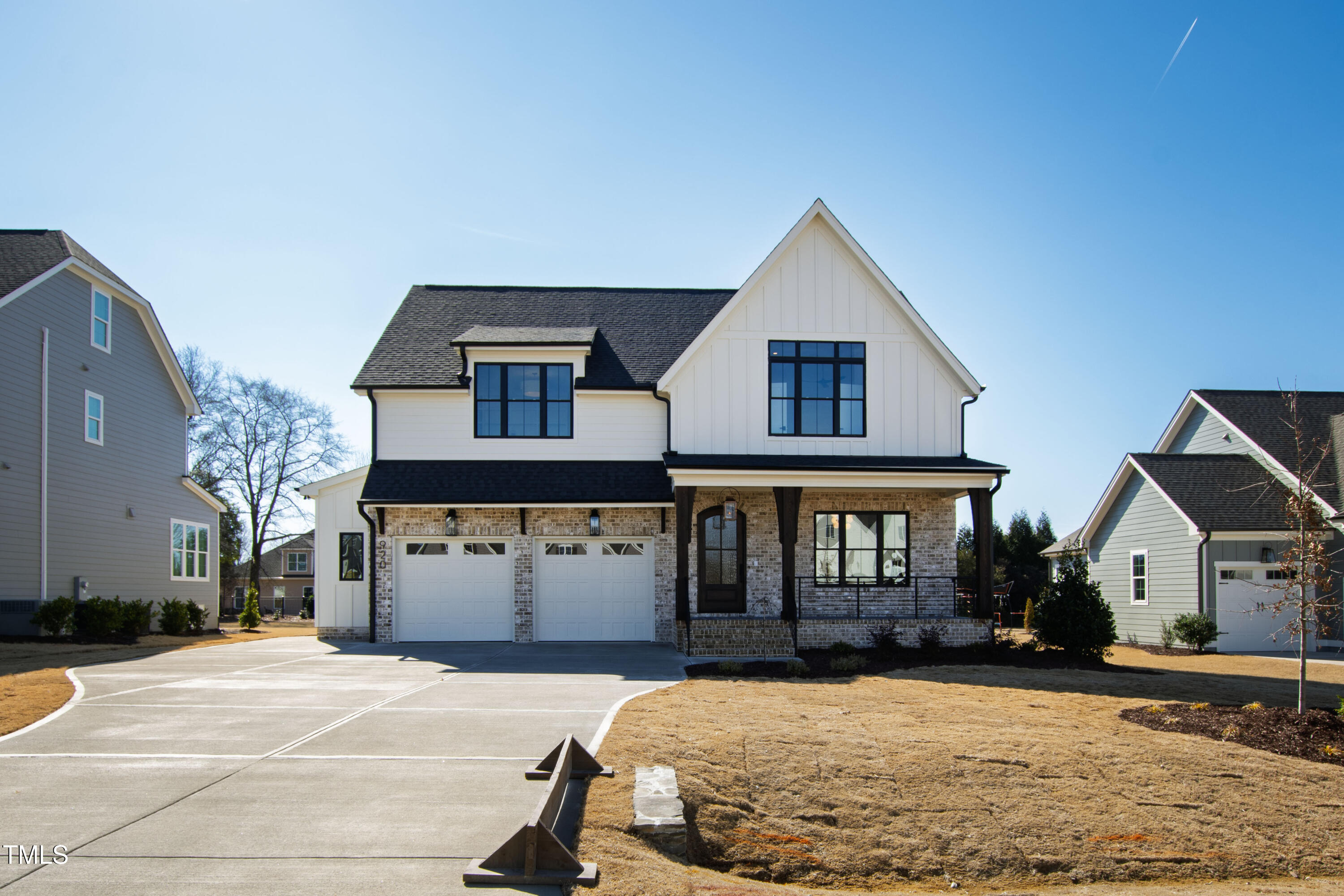 920 Lily Claire Lane Fuquay-Varina, NC 27526 - Photo 1 of 62 a front view of a house with yard