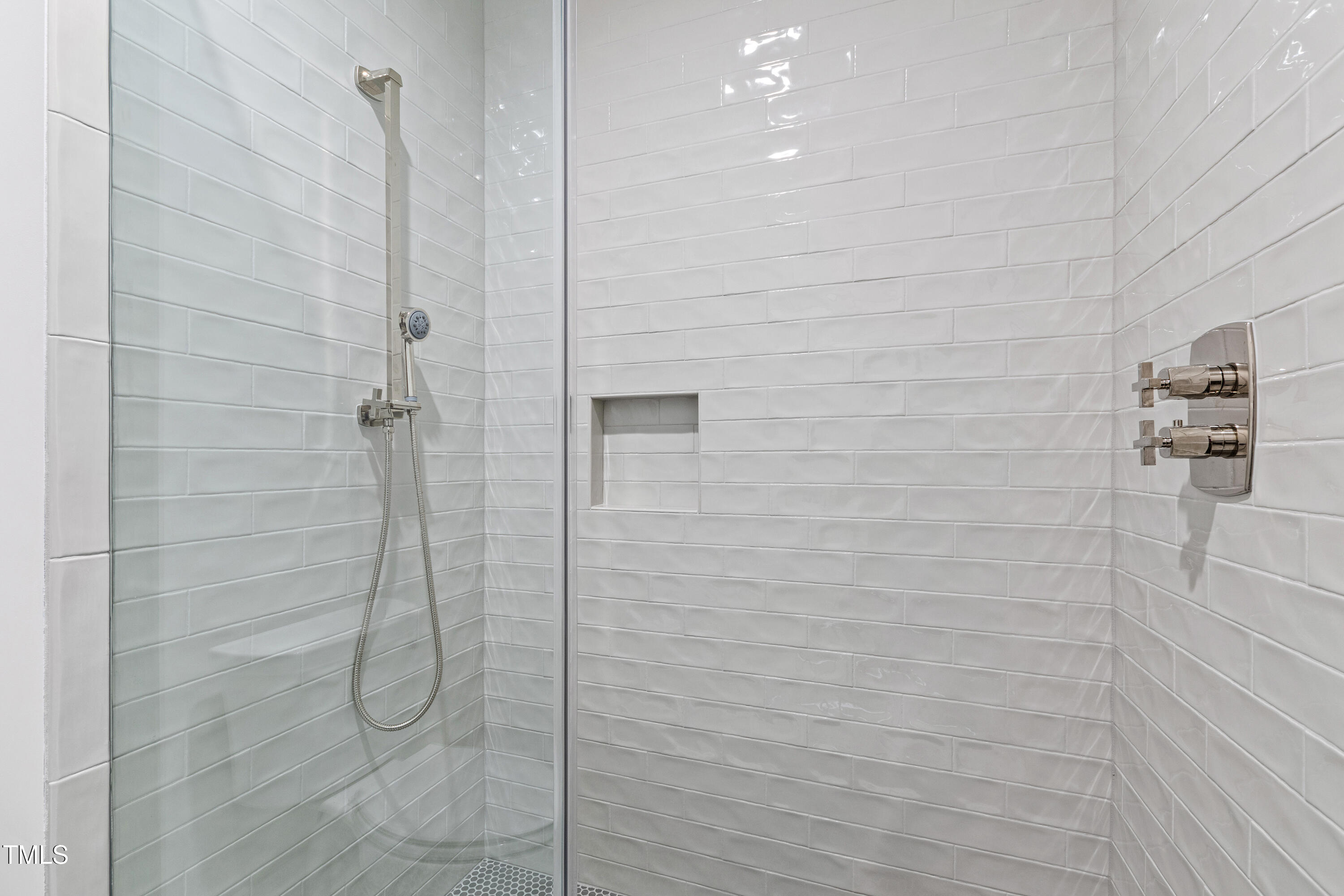 920 Lily Claire Lane Fuquay-Varina, NC 27526 - Photo 38 of 62 a bathroom with a shower