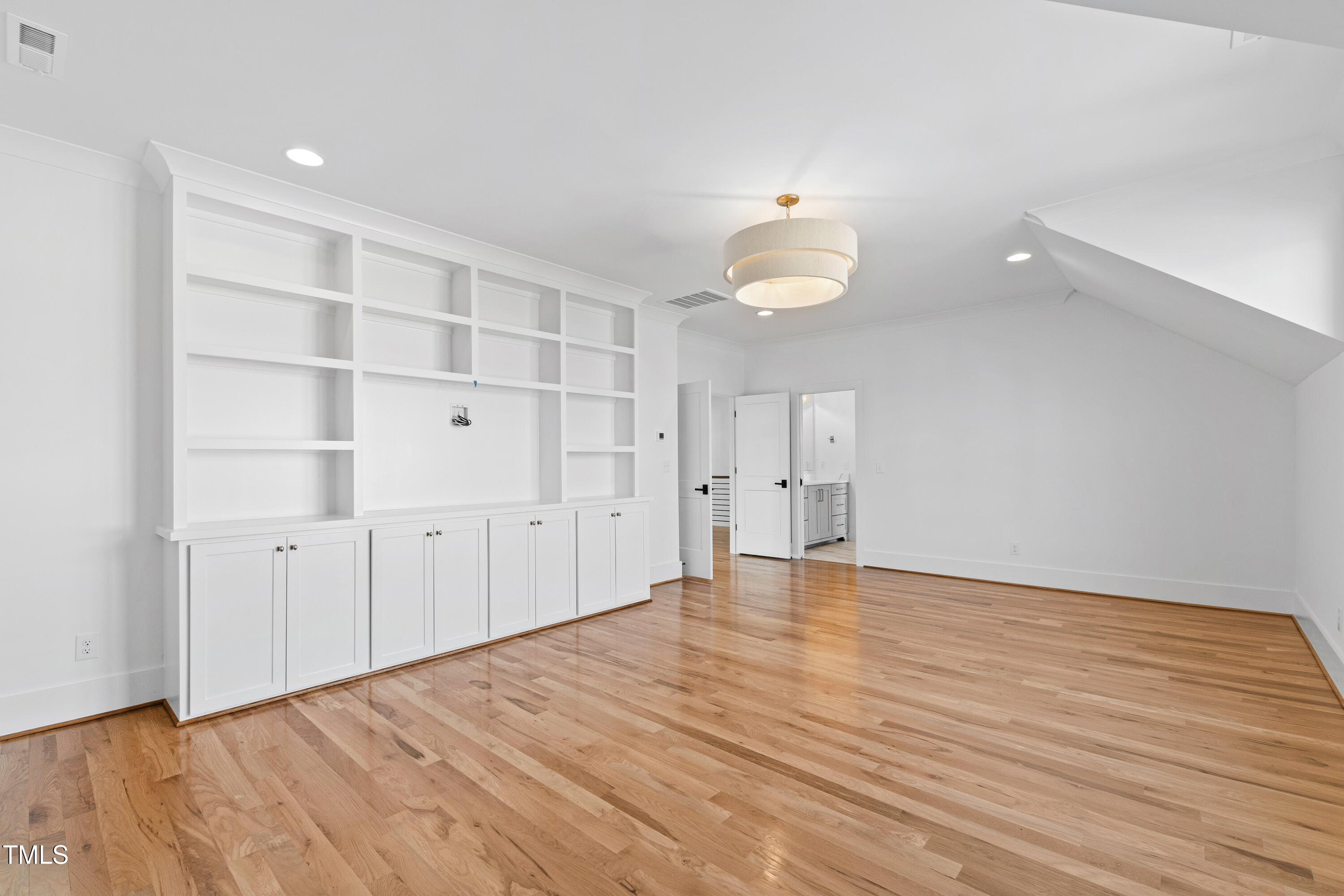 920 Lily Claire Lane Fuquay-Varina, NC 27526 - Photo 39 of 62 wooden floor in an empty room