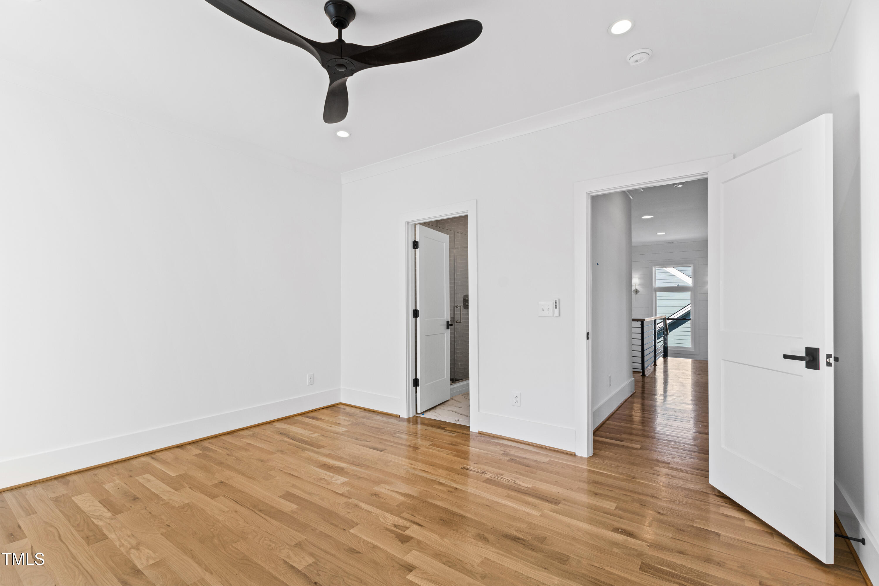 920 Lily Claire Lane Fuquay-Varina, NC 27526 - Photo 42 of 62 a view of empty room with wooden floor