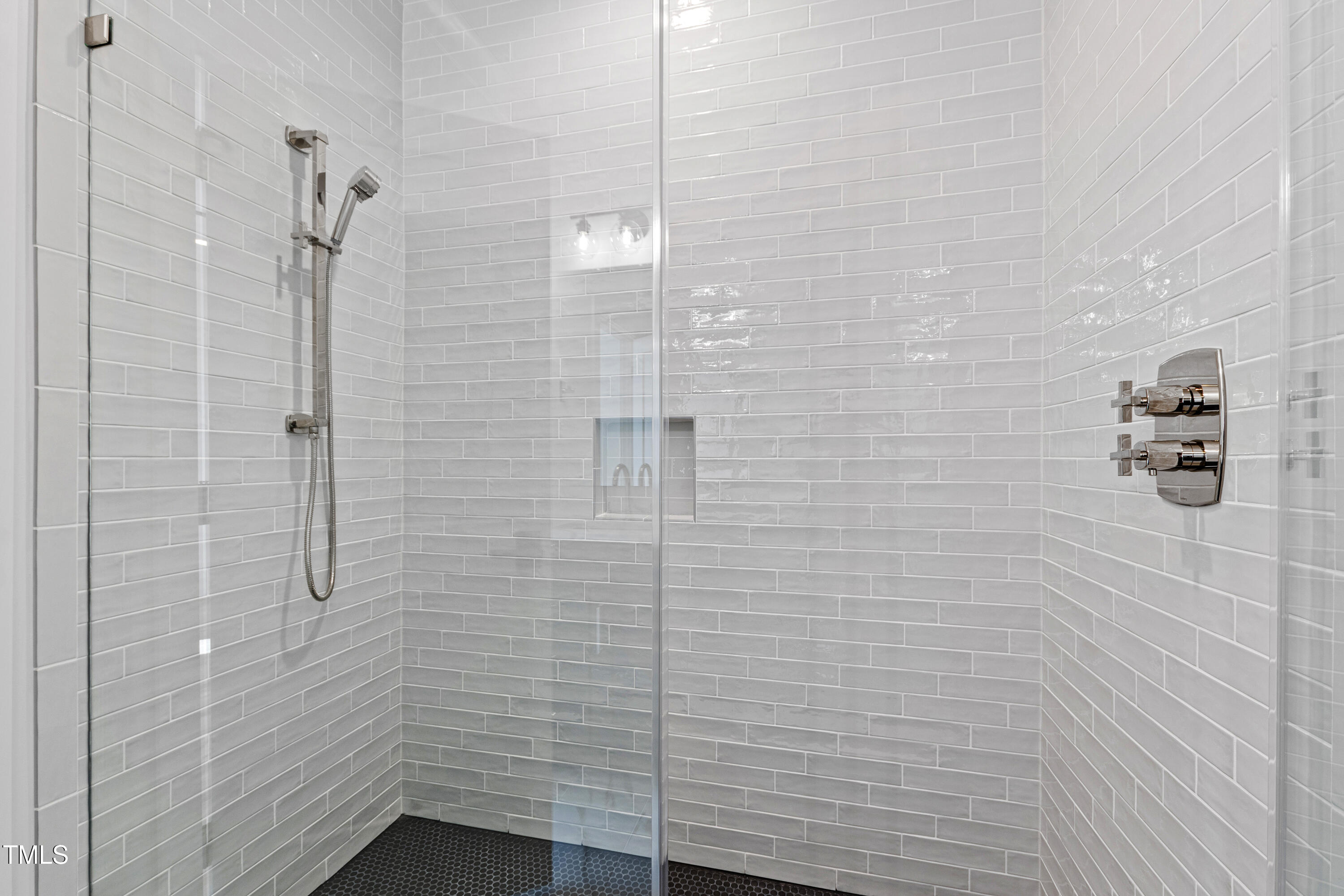 920 Lily Claire Lane Fuquay-Varina, NC 27526 - Photo 45 of 62 a bathroom with a shower