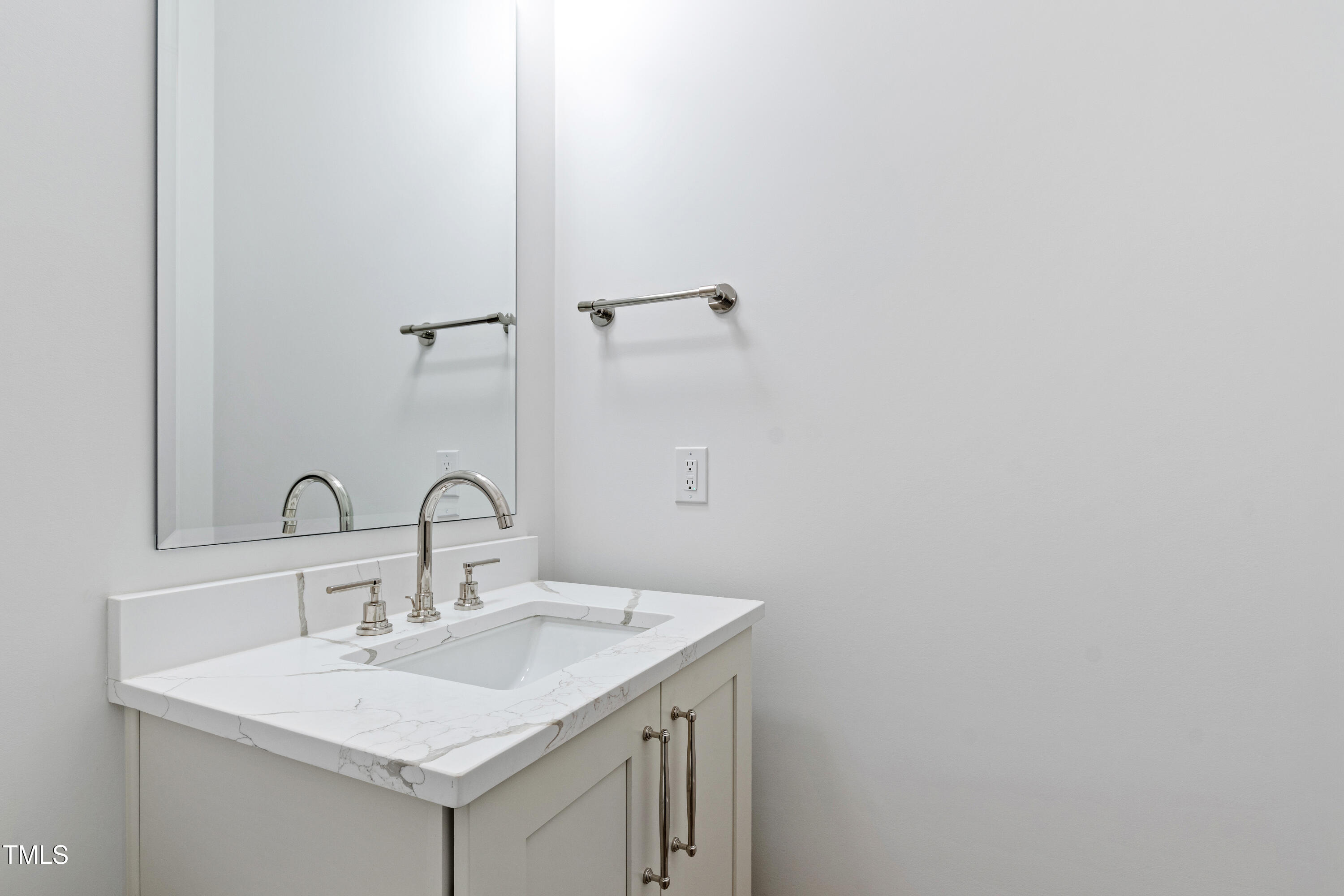 920 Lily Claire Lane Fuquay-Varina, NC 27526 - Photo 49 of 62 a bathroom with a sink and vanity