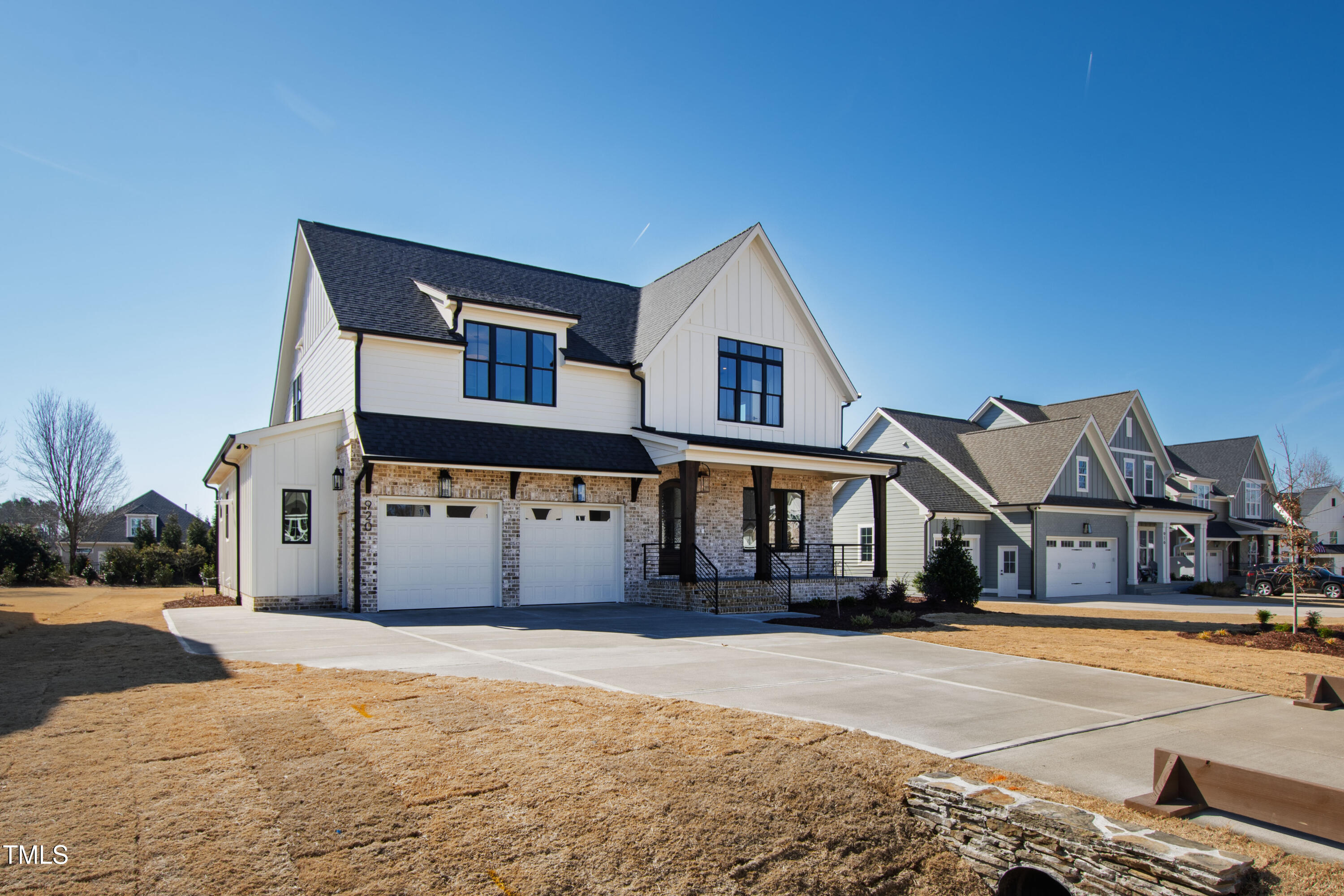 920 Lily Claire Lane Fuquay-Varina, NC 27526 - Photo 61 of 62 a front view of a house with a yard