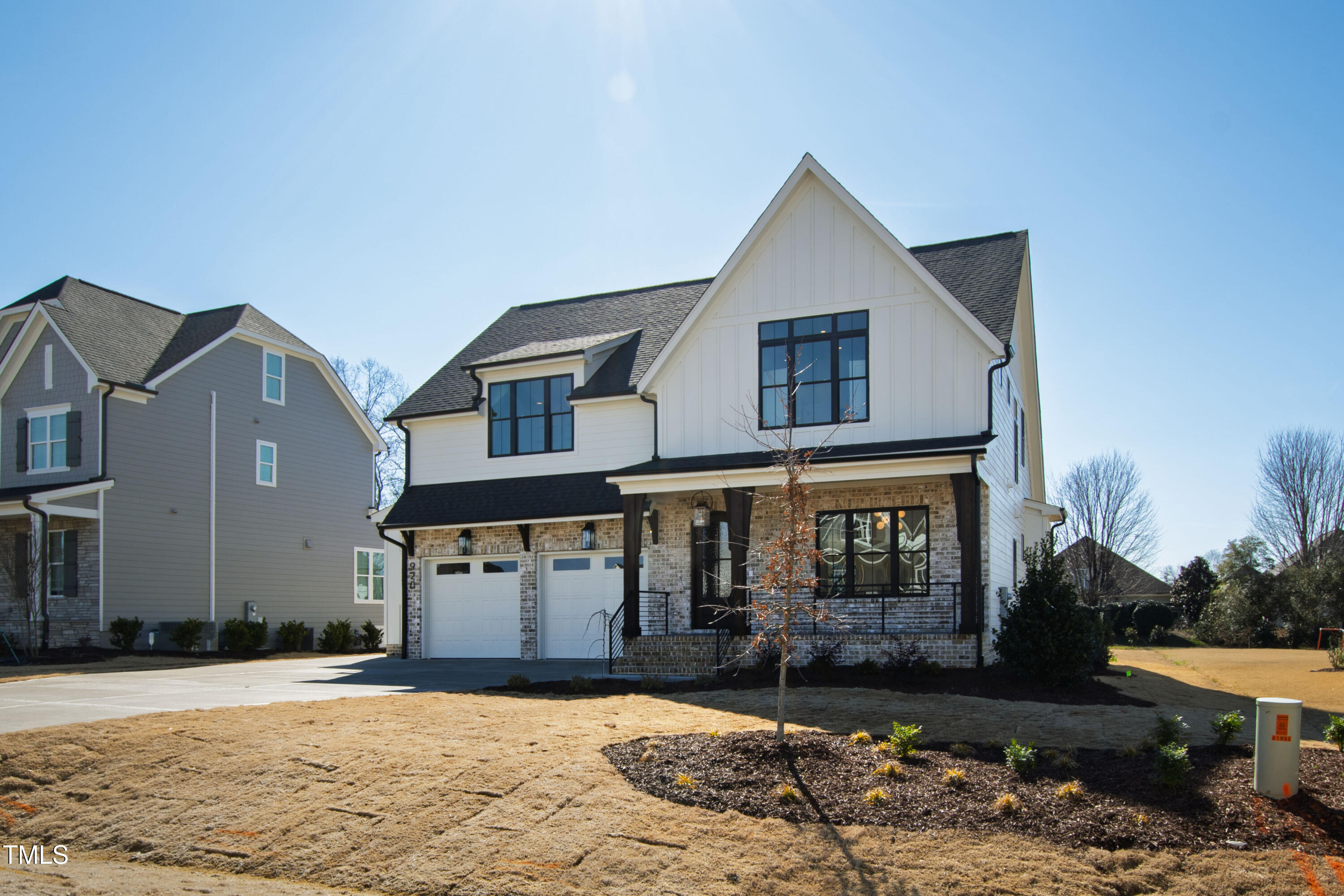 920 Lily Claire Lane Fuquay-Varina, NC 27526 - Photo 62 of 62 a front view of a house with a yard