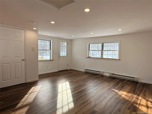 a view of a town with barn house