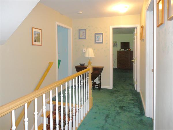63 Stone Ridge Drive Northampton, MA 01062 - Photo 17 of 26 a view of a porch with a bench