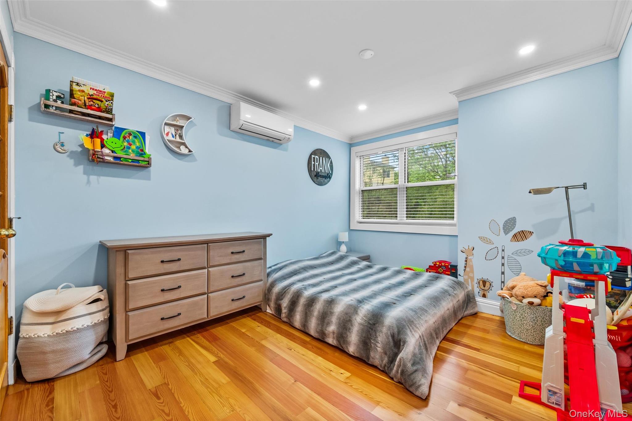 751 Rte 9W Fort Montgomery, NY 10922 - Photo 29 of 41 a bedroom with a bed and a window