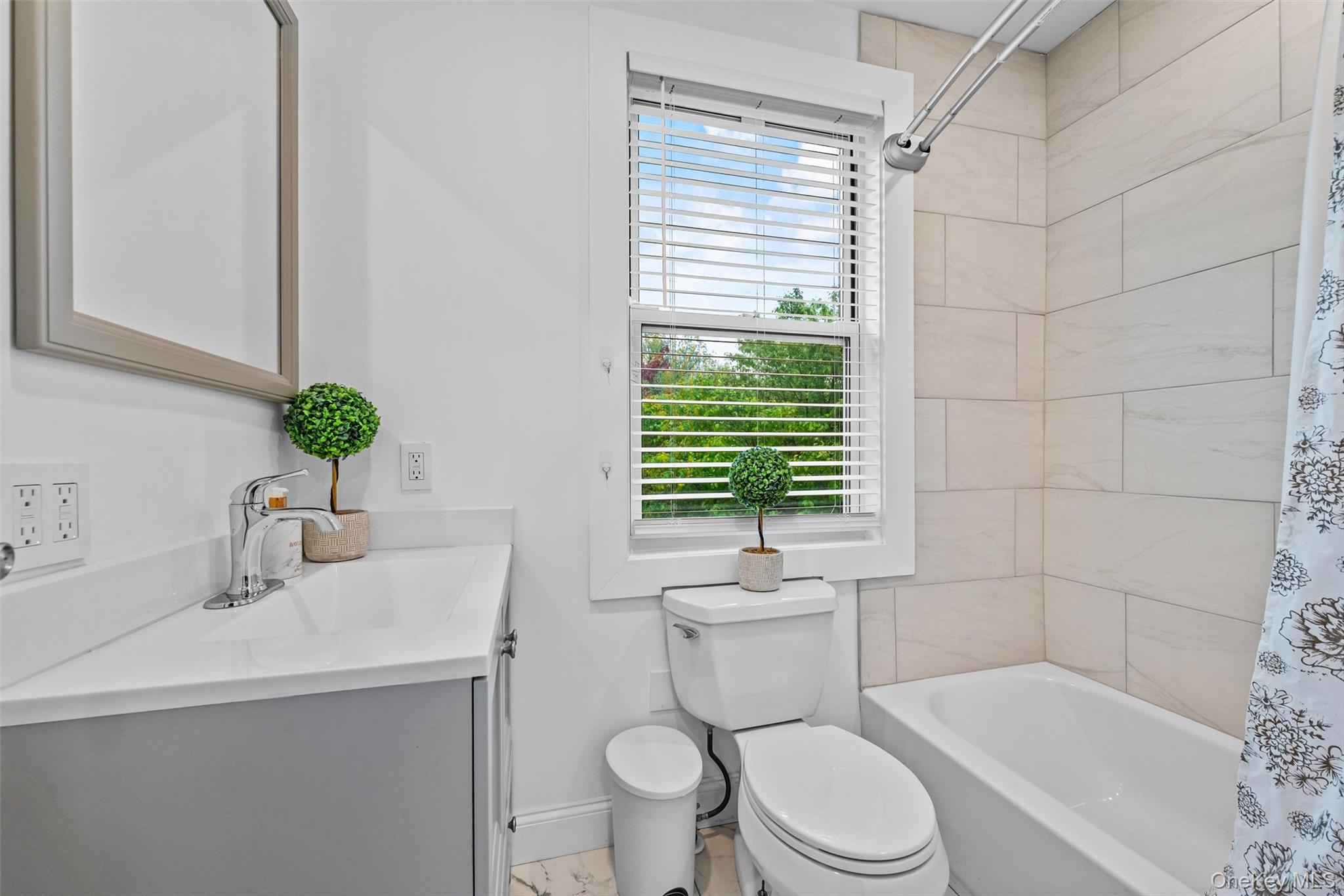 751 Rte 9W Fort Montgomery, NY 10922 - Photo 31 of 41 a bathroom with a sink a toilet a mirror and shower