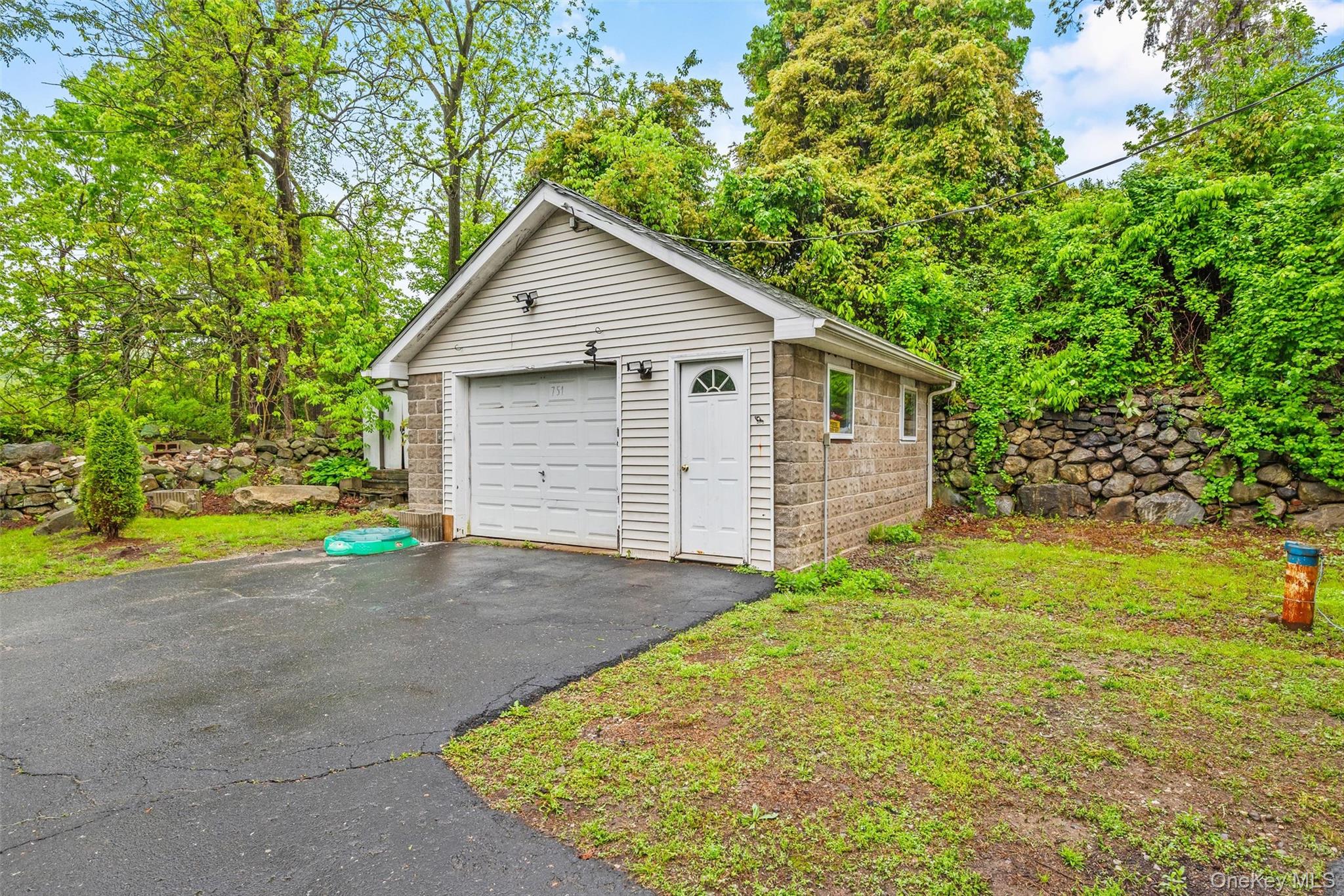 751 Rte 9W Fort Montgomery, NY 10922 - Photo 36 of 41 a view of backyard of house with green space
