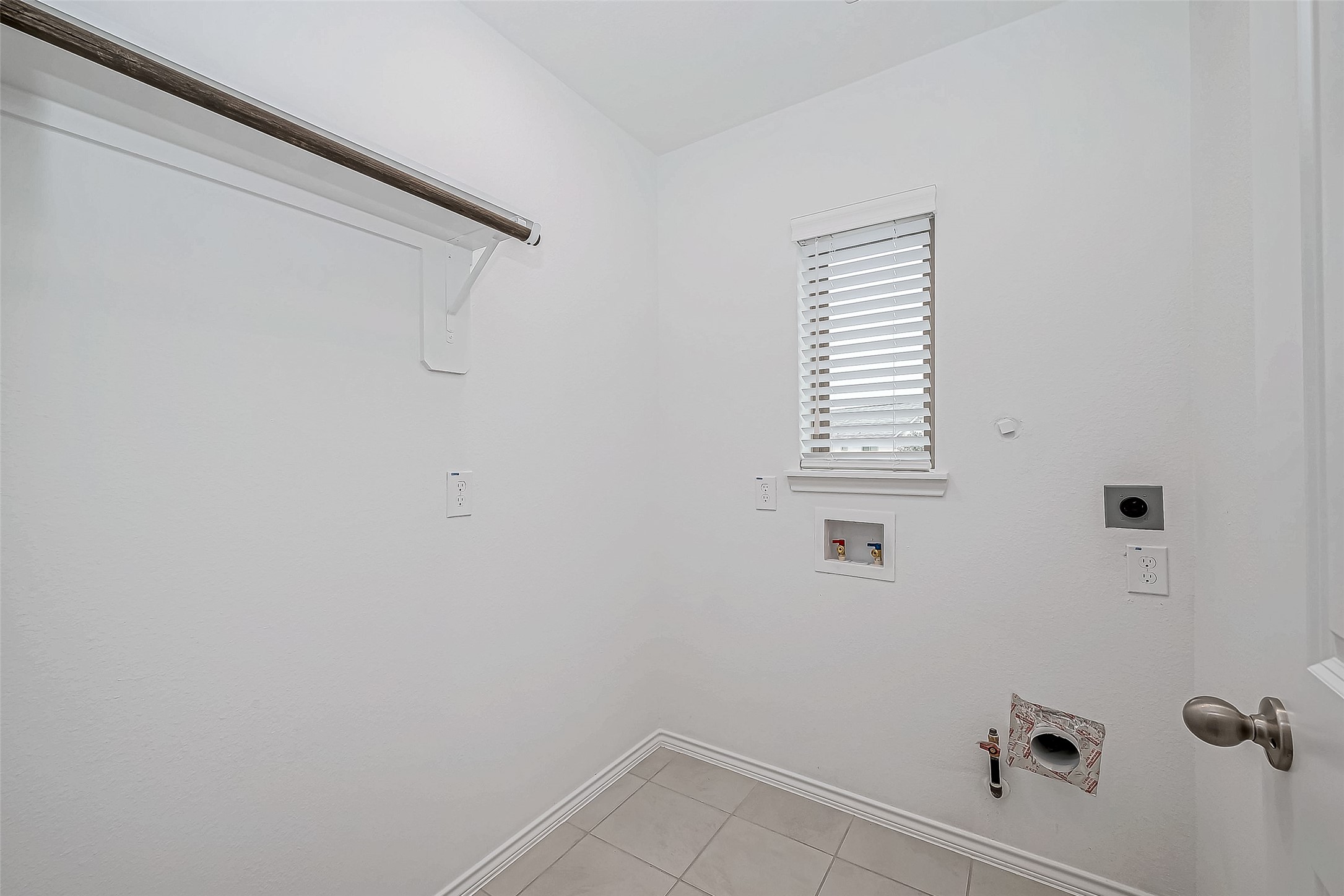 31801 Pecan Cottage Lane Spring, TX 77386 - Photo 22 of 37 a bathroom with a window and a shower