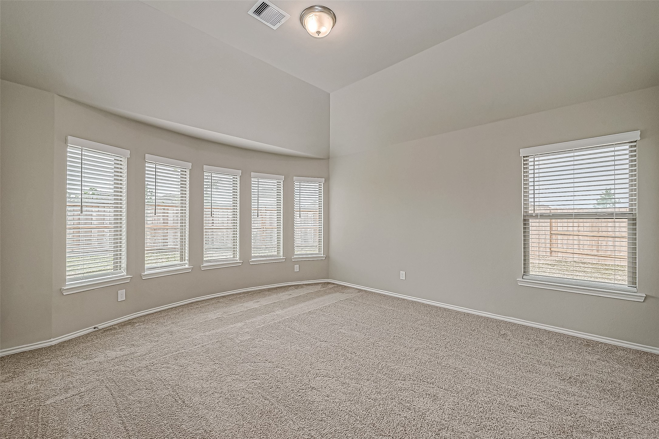 31801 Pecan Cottage Lane Spring, TX 77386 - Photo 26 of 37 an empty room with windows