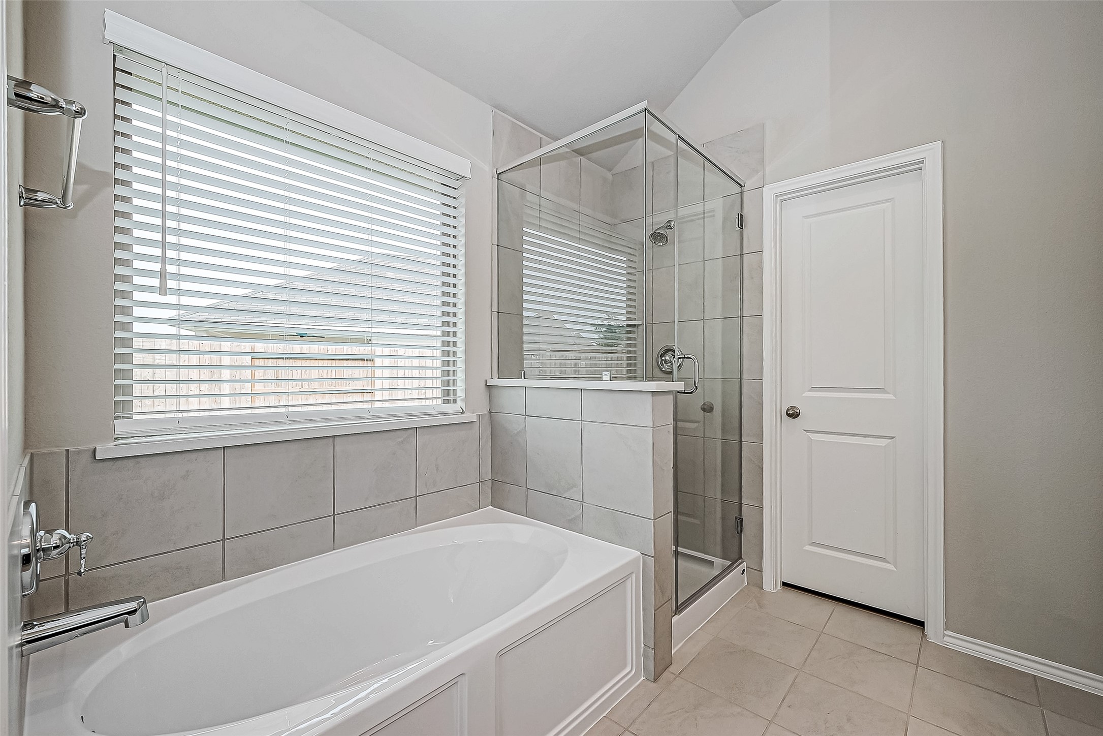 31801 Pecan Cottage Lane Spring, TX 77386 - Photo 28 of 37 a bath room with a bathtub and a shower