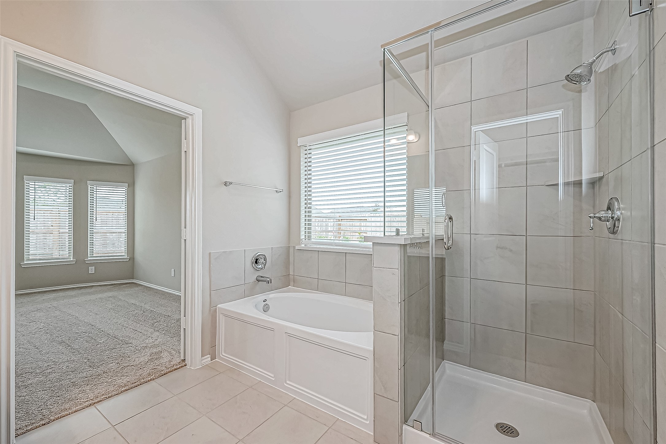 31801 Pecan Cottage Lane Spring, TX 77386 - Photo 30 of 37 a white bath tub sitting next to a shower