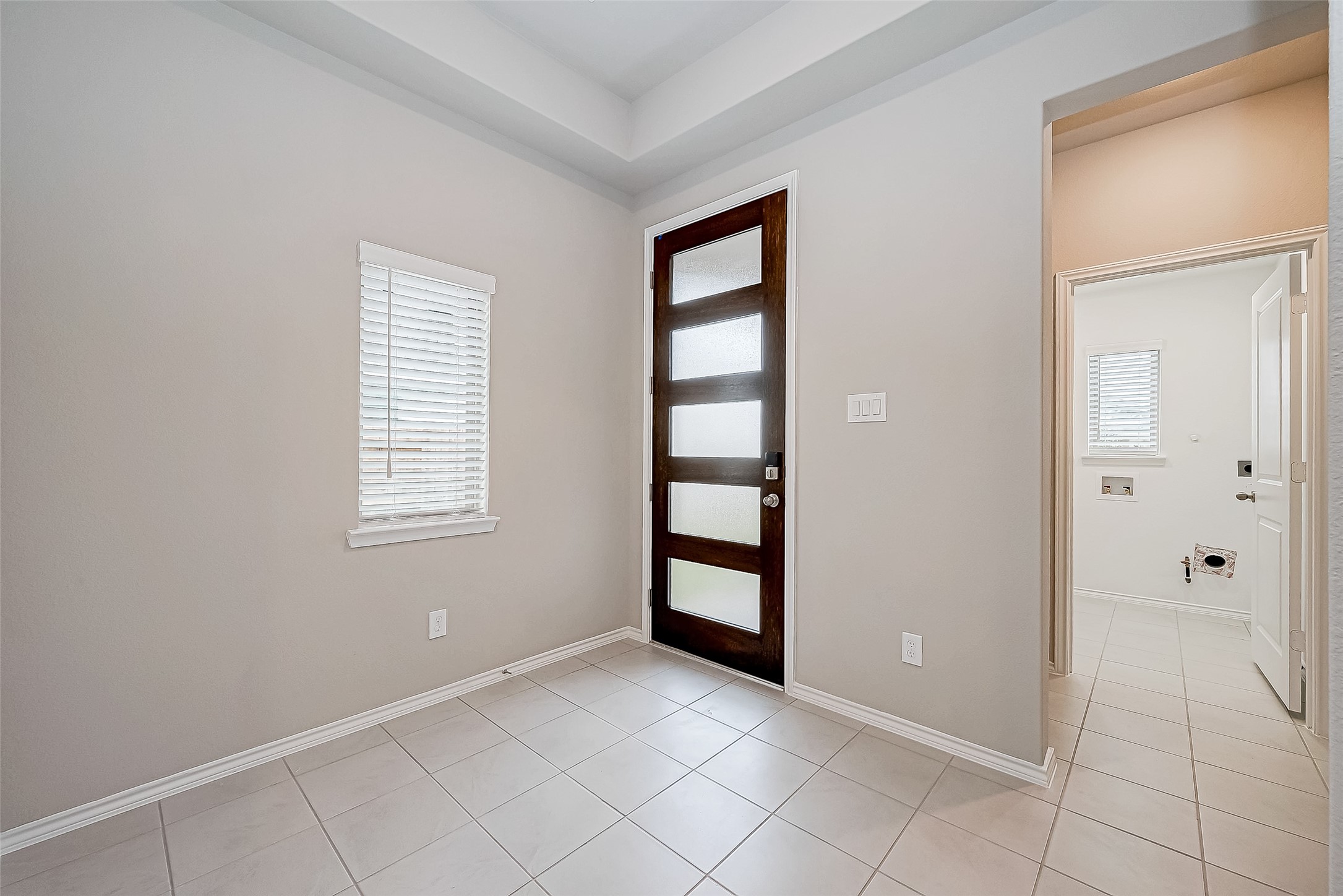 31801 Pecan Cottage Lane Spring, TX 77386 - Photo 3 of 37 an empty room with windows