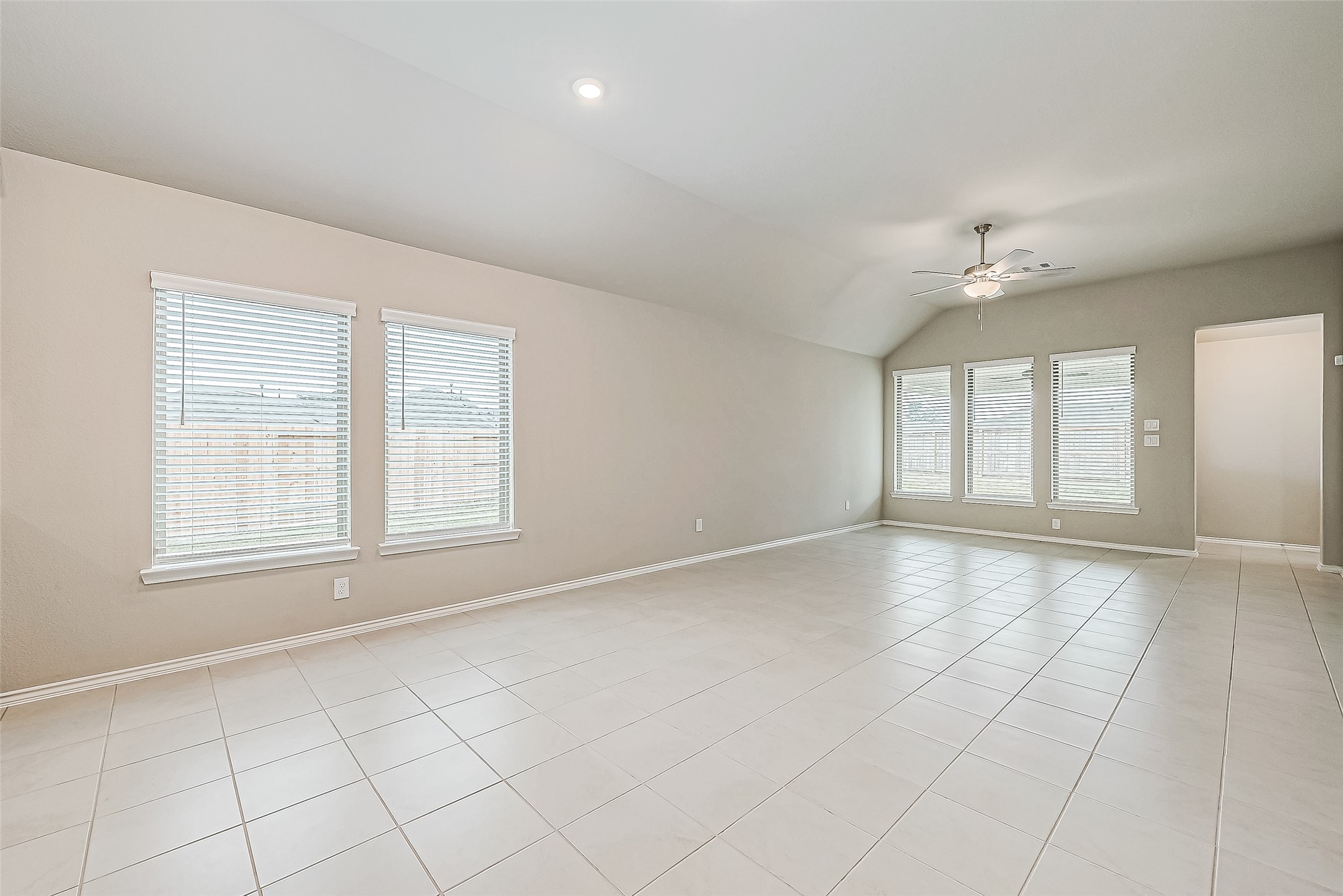 31801 Pecan Cottage Lane Spring, TX 77386 - Photo 10 of 37 an empty room with windows and closet