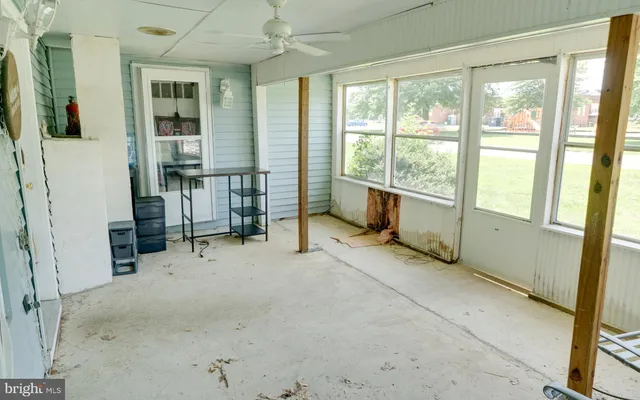 an empty room with windows