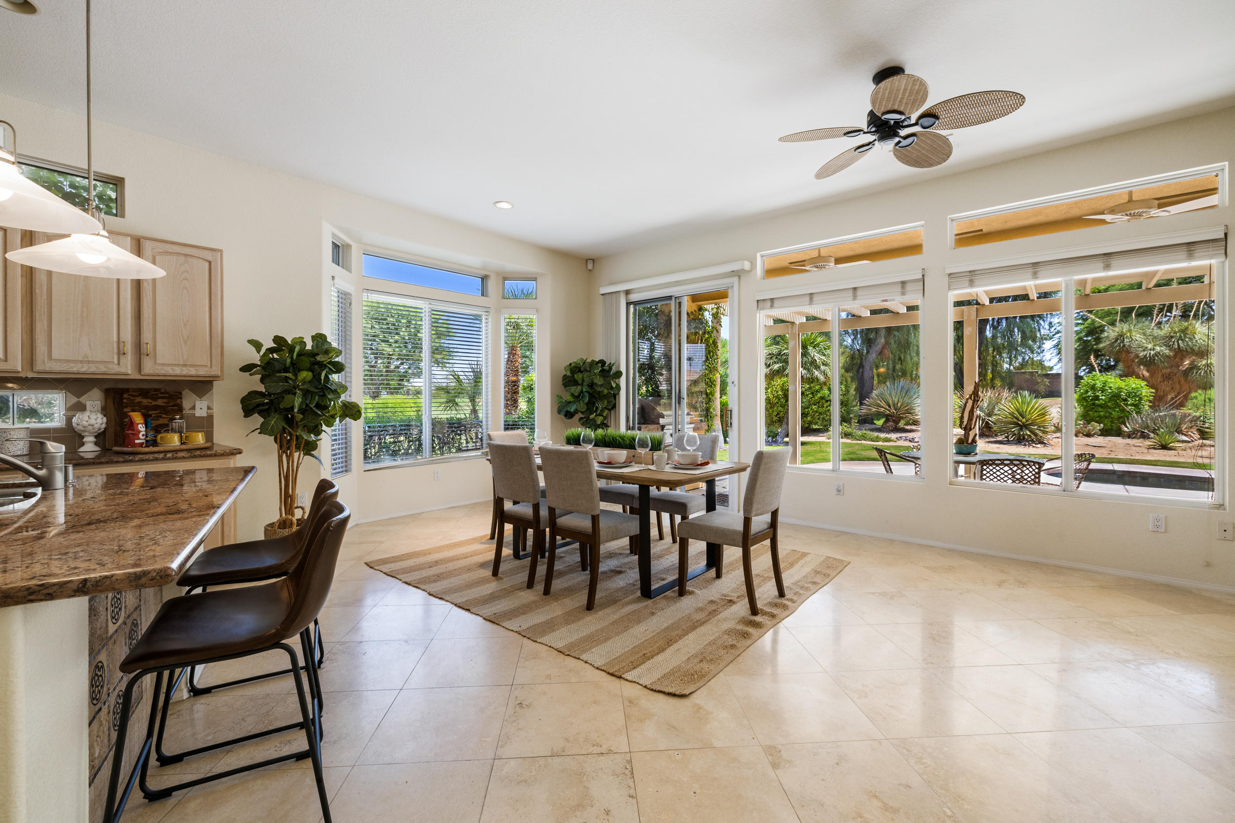 44410 Royal Lytham Drive Indio, CA 92201 - Photo 11 of 72 a view of a dining room with furniture window and outside view