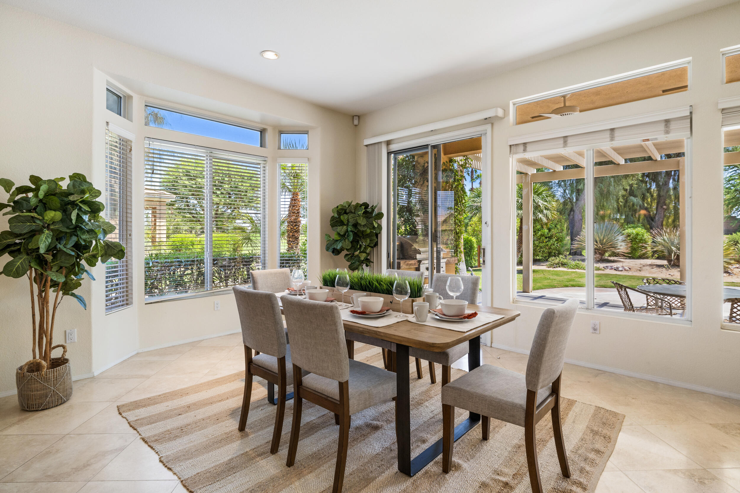 44410 Royal Lytham Drive Indio, CA 92201 - Photo 14 of 72 a dining room with furniture window and outside view