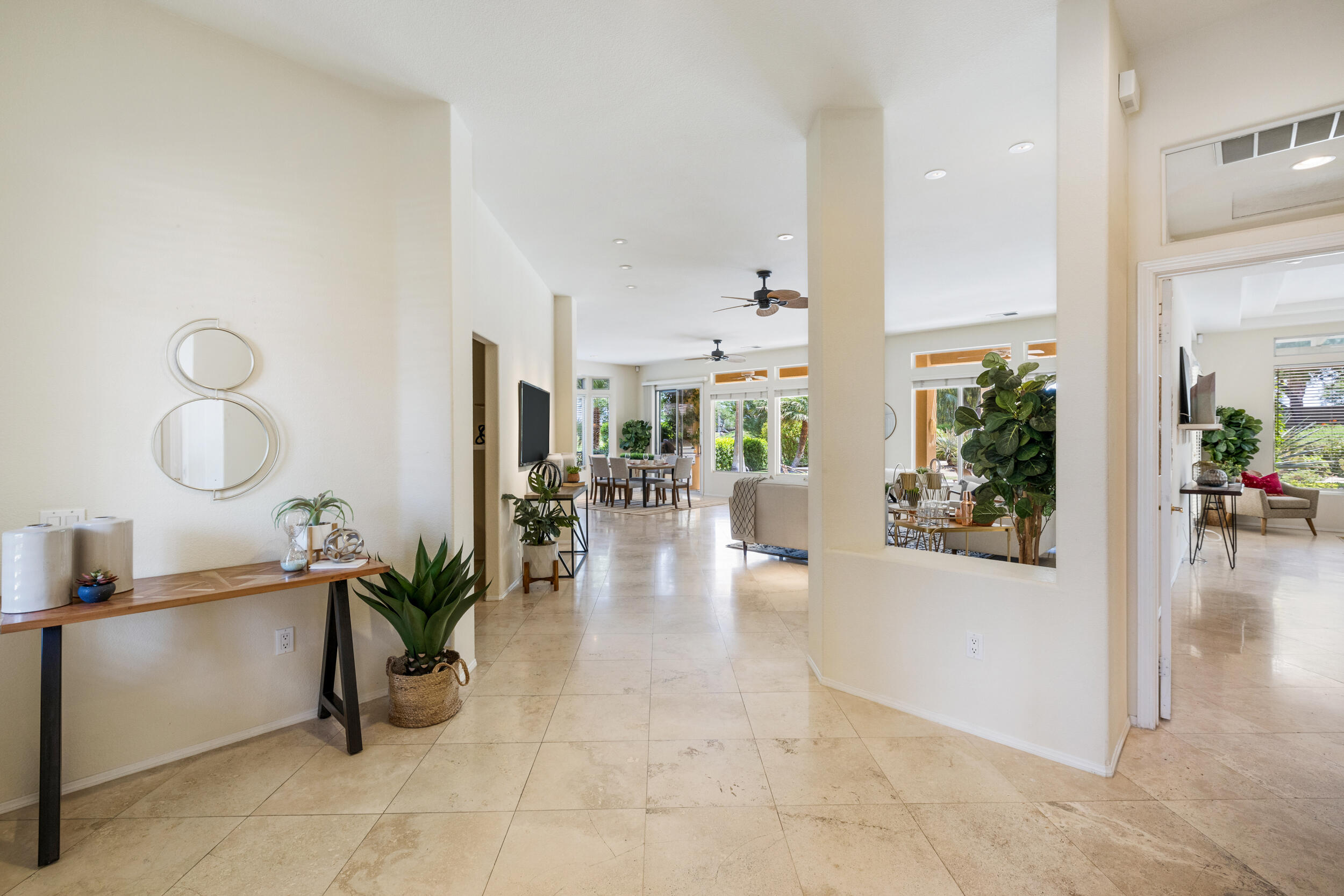 44410 Royal Lytham Drive Indio, CA 92201 - Photo 3 of 72 a lobby with furniture and potted plants