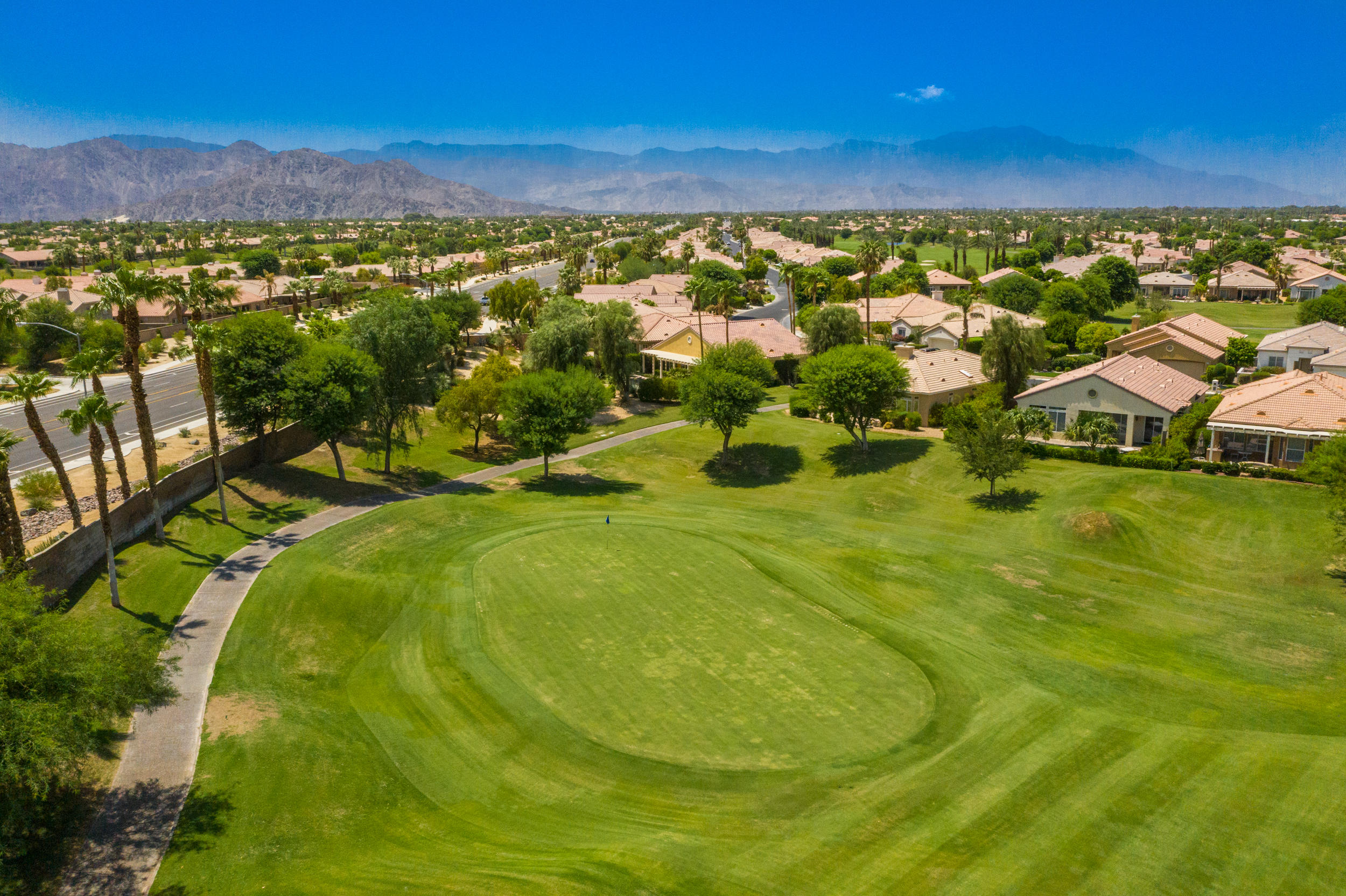 44410 Royal Lytham Drive Indio, CA 92201 - Photo 44 of 72 a view of an outdoor space and a lake view