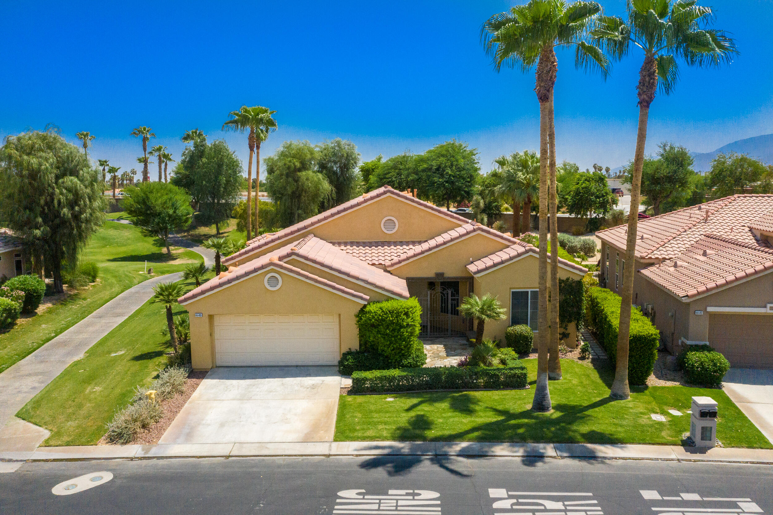 44410 Royal Lytham Drive Indio, CA 92201 - Photo 51 of 72 a aerial view of a house with palm trees