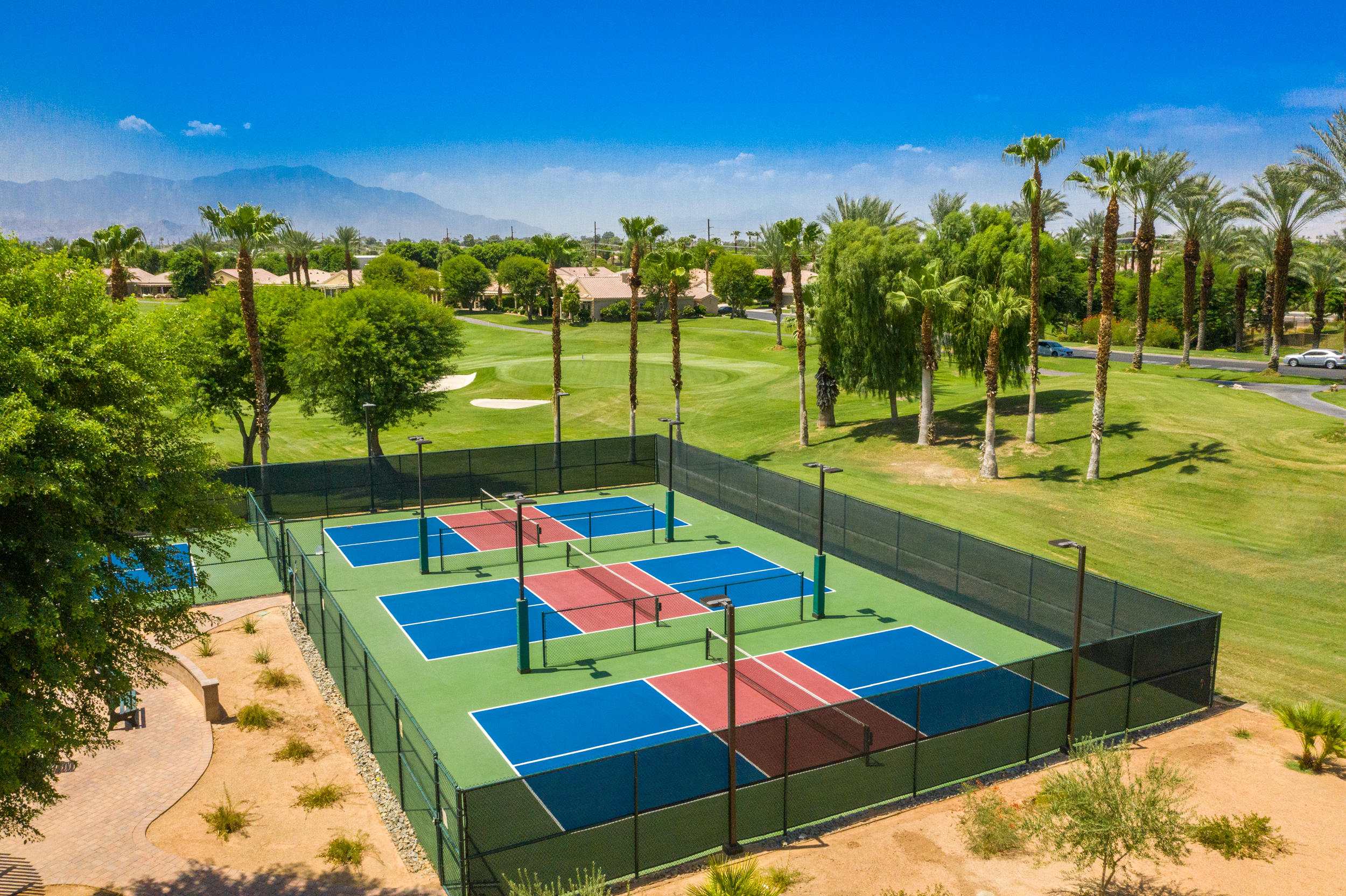 44410 Royal Lytham Drive Indio, CA 92201 - Photo 52 of 72 a view of swimming pool with a patio