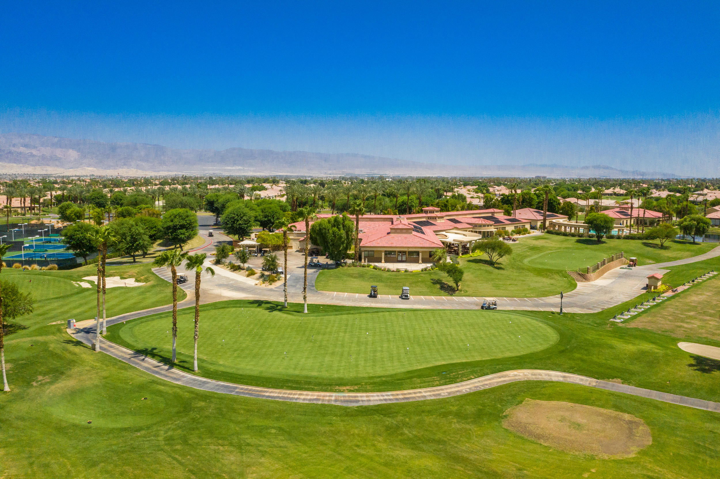 44410 Royal Lytham Drive Indio, CA 92201 - Photo 59 of 72 a view of a swimming pool with a lake view