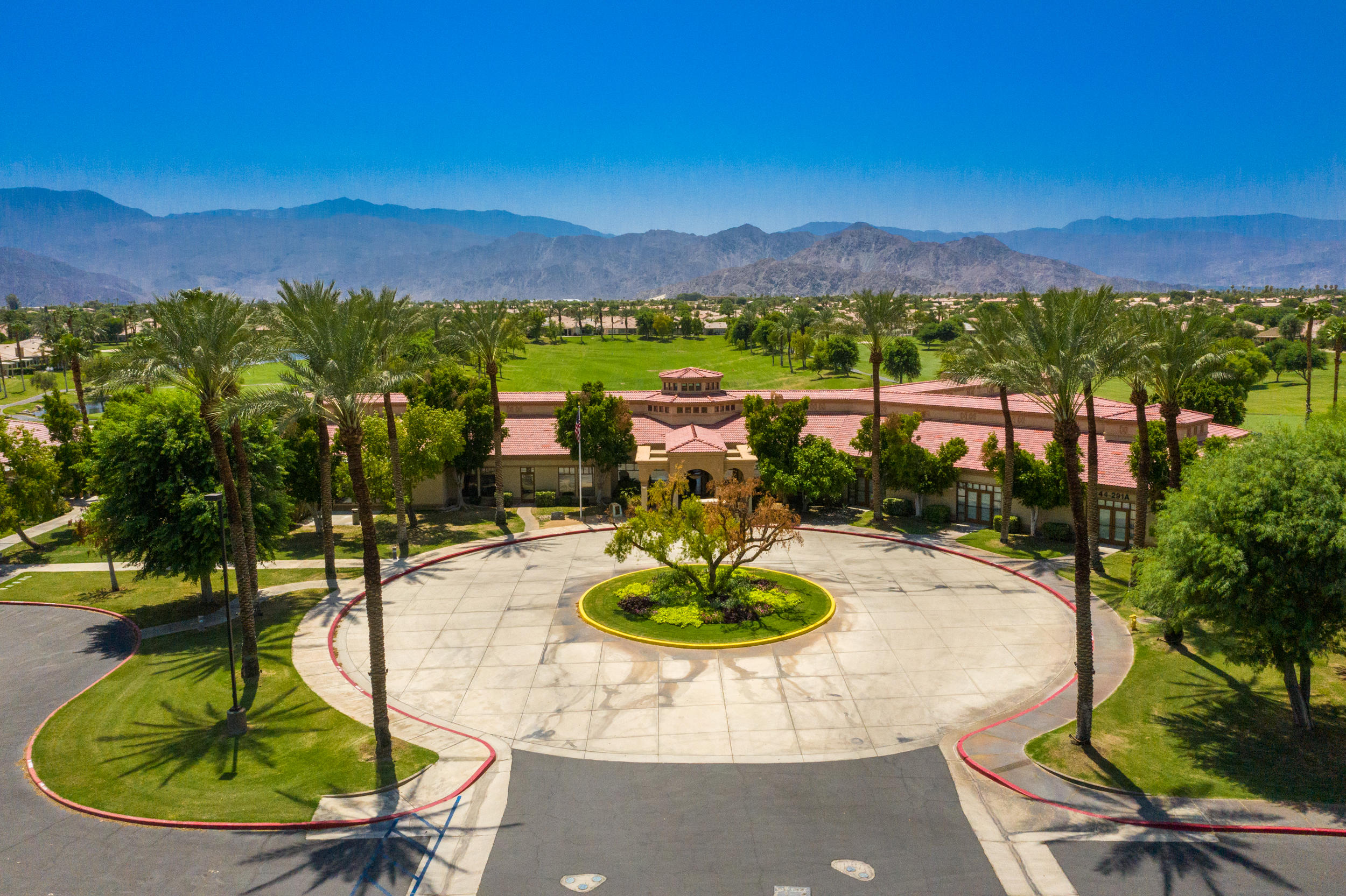 44410 Royal Lytham Drive Indio, CA 92201 - Photo 70 of 72 a view of a swimming pool with a table and chairs