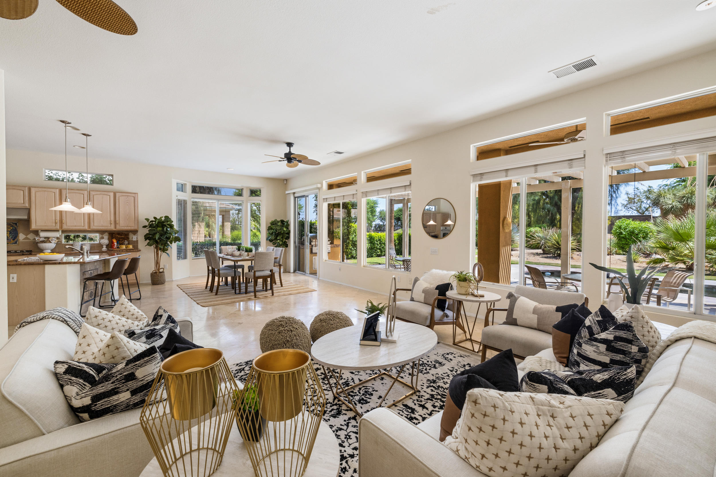 44410 Royal Lytham Drive Indio, CA 92201 - Photo 9 of 72 a living room with furniture and a large window