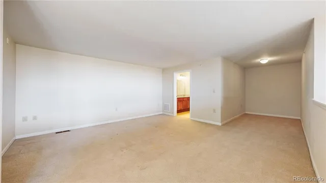 an empty room with an entryway