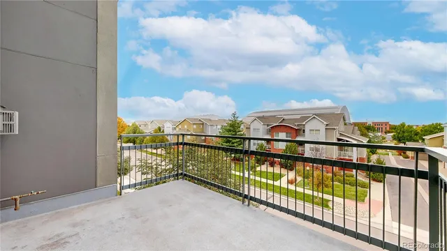 a view of a balcony with city view
