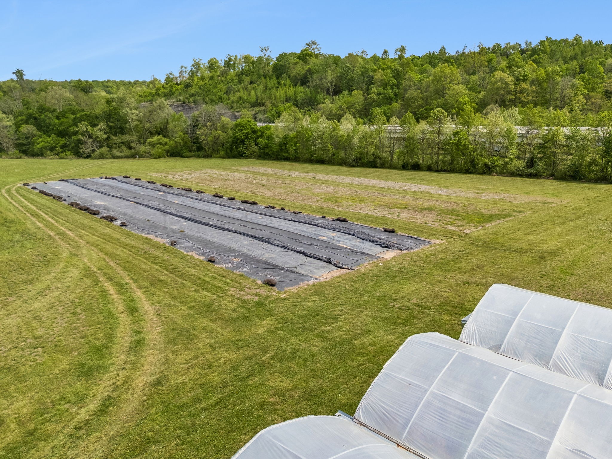 2461 Bodenham Road Pulaski, TN 38478 - Photo 97 of 100 a view of a swimming pool with a yard