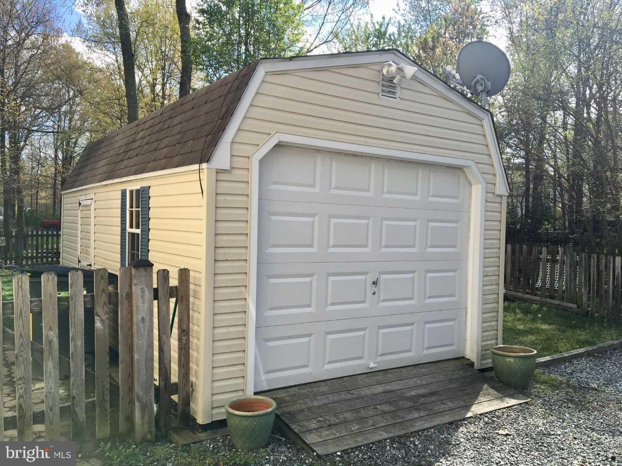 1301 Steamboat Road Shady Side, MD 20764 - Photo 3 of 26 Detached garage has storage and attached shed
