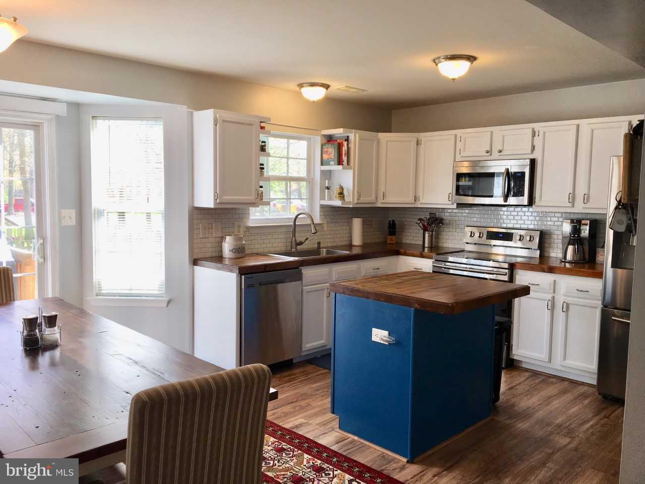 1301 Steamboat Road Shady Side, MD 20764 - Photo 7 of 26 Kitchen island for additional counter space