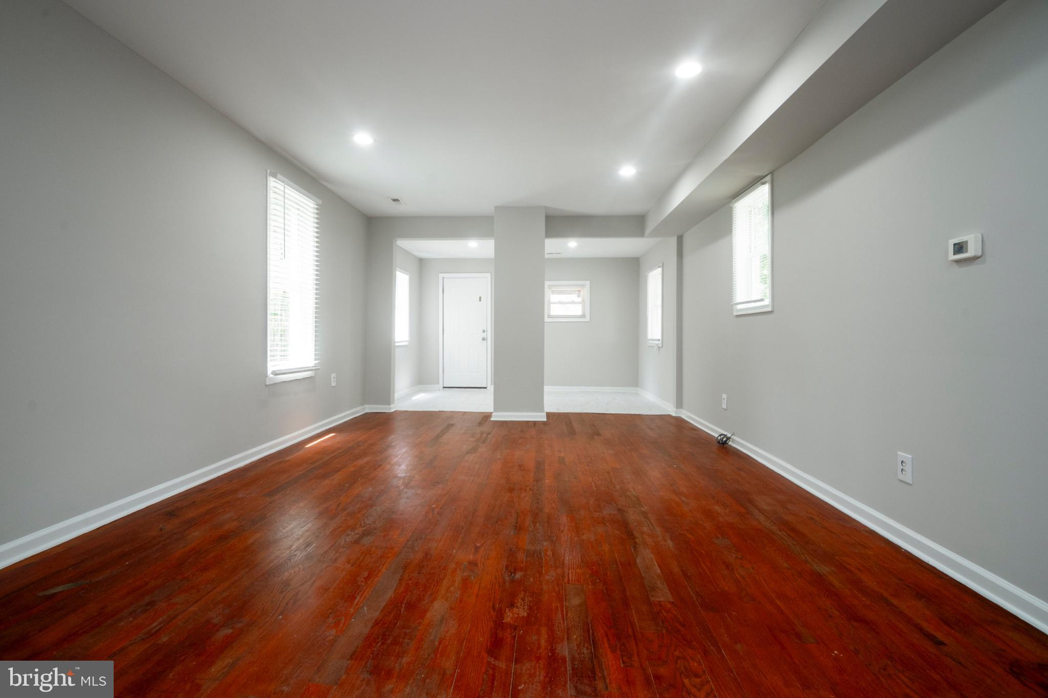3708 7th Street Baltimore, MD 21225 - Photo 3 of 8 Spacious, sunlit room with charm.