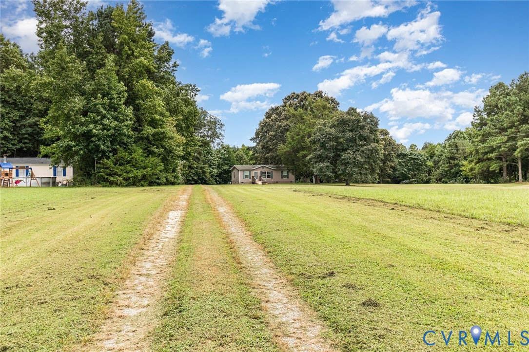 1292 Mt Prospect Road Laneview, VA 22504 - Photo 22 of 25 a view of an outdoor space and swimming pool