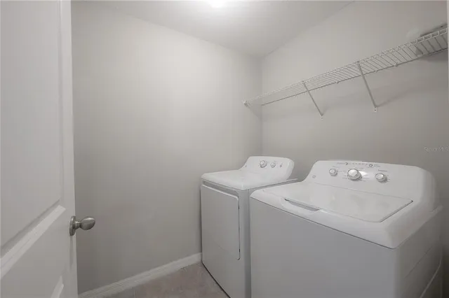 a view of a bathroom from a hallway