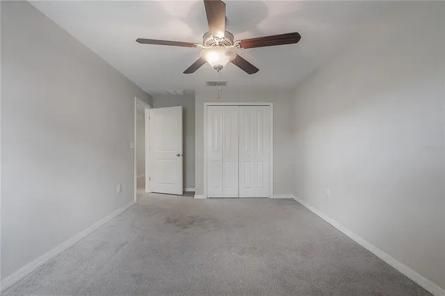 a view of a room with a large window