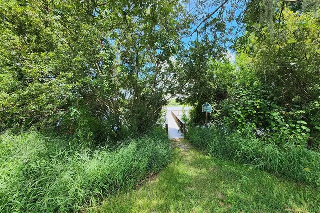 a view of deck with wooden floor and fence