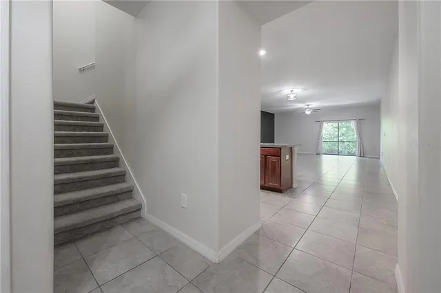 a kitchen with stainless steel appliances granite countertop a sink and a stove