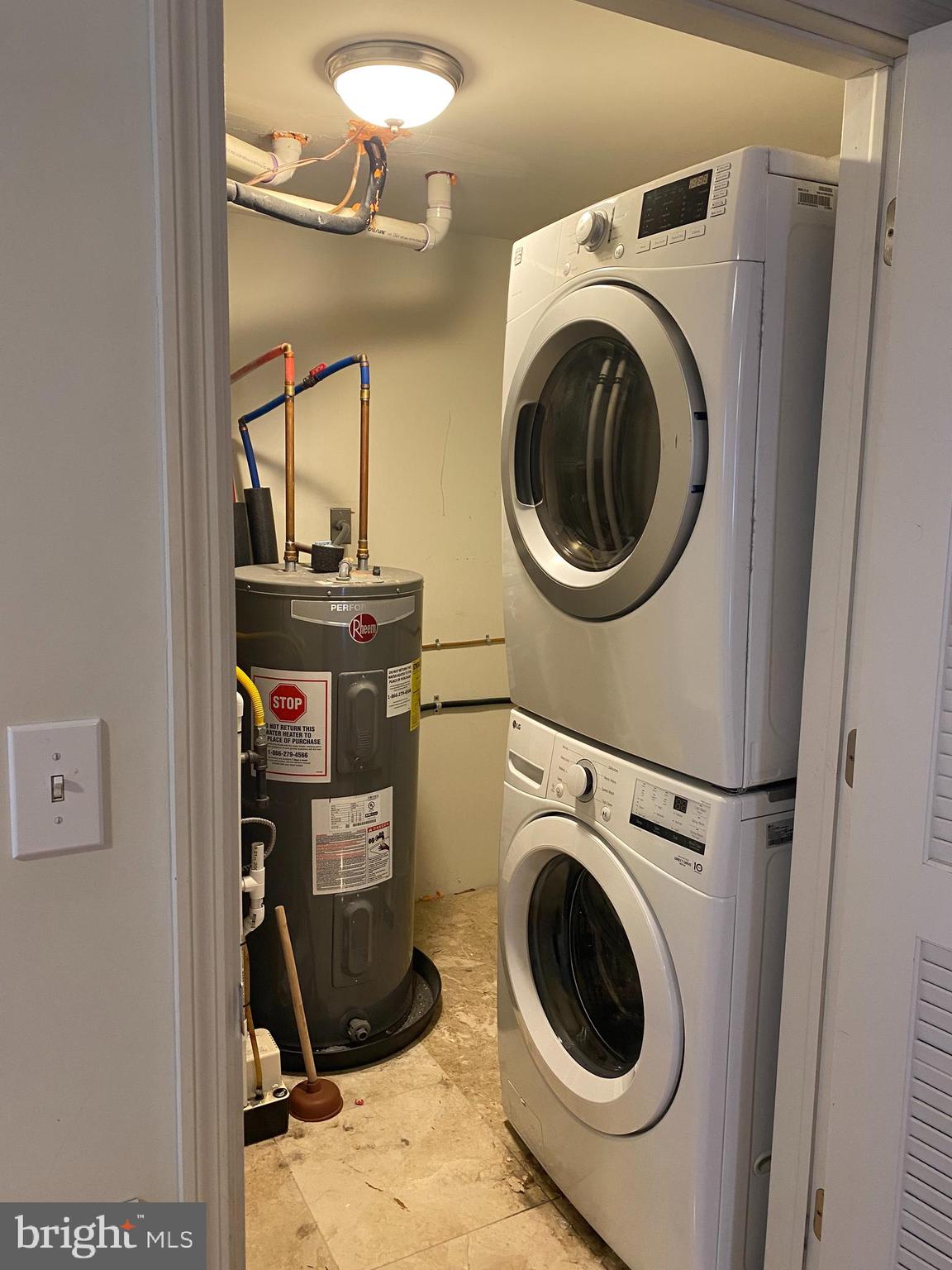 58 South Broadway, Unit 58C Pitman, NJ 08071 - Photo 19 of 35 a utility room with dryer and washer